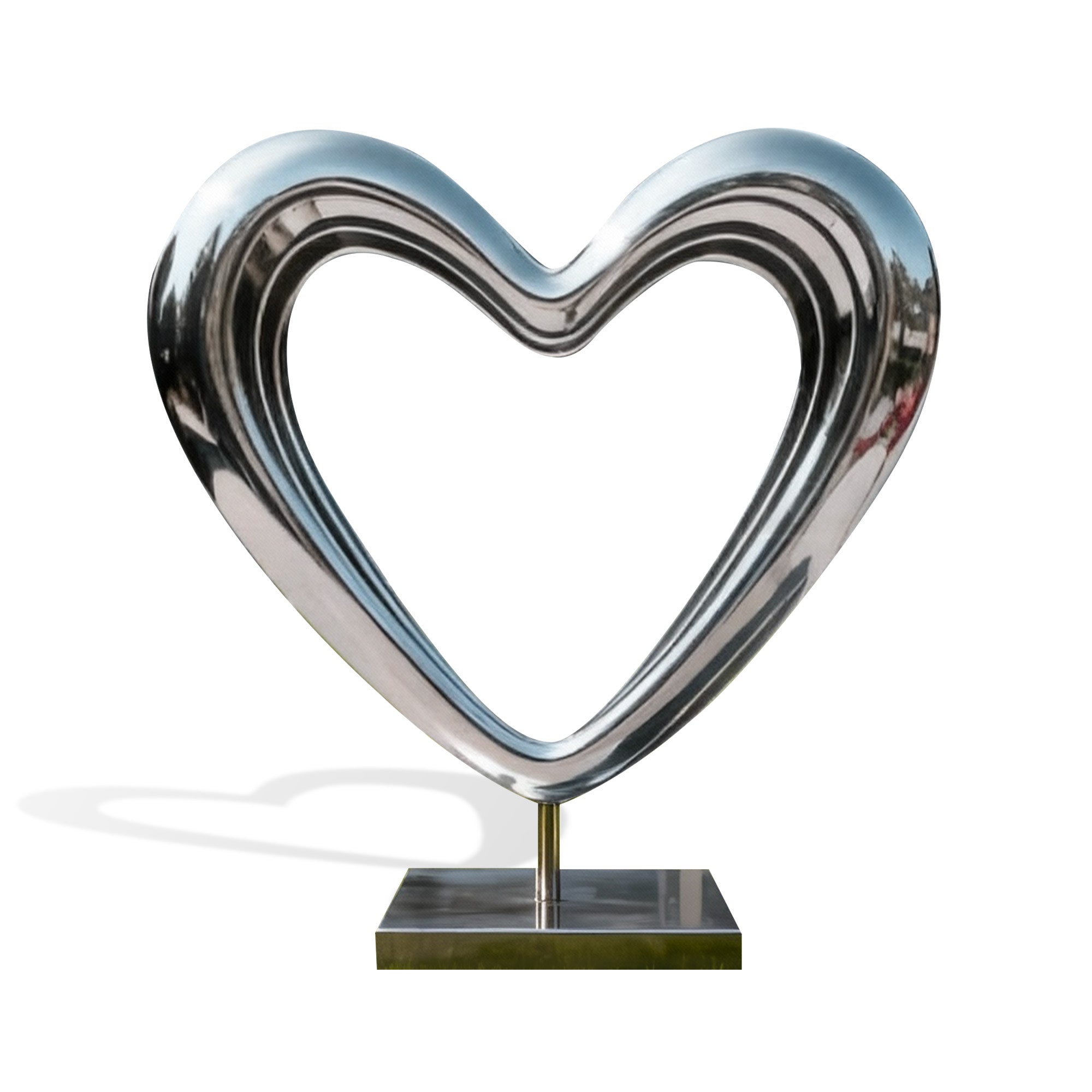 Mirror-polished stainless steel open-heart sculpture with minimalist pedestal base, shown on a clean white background.