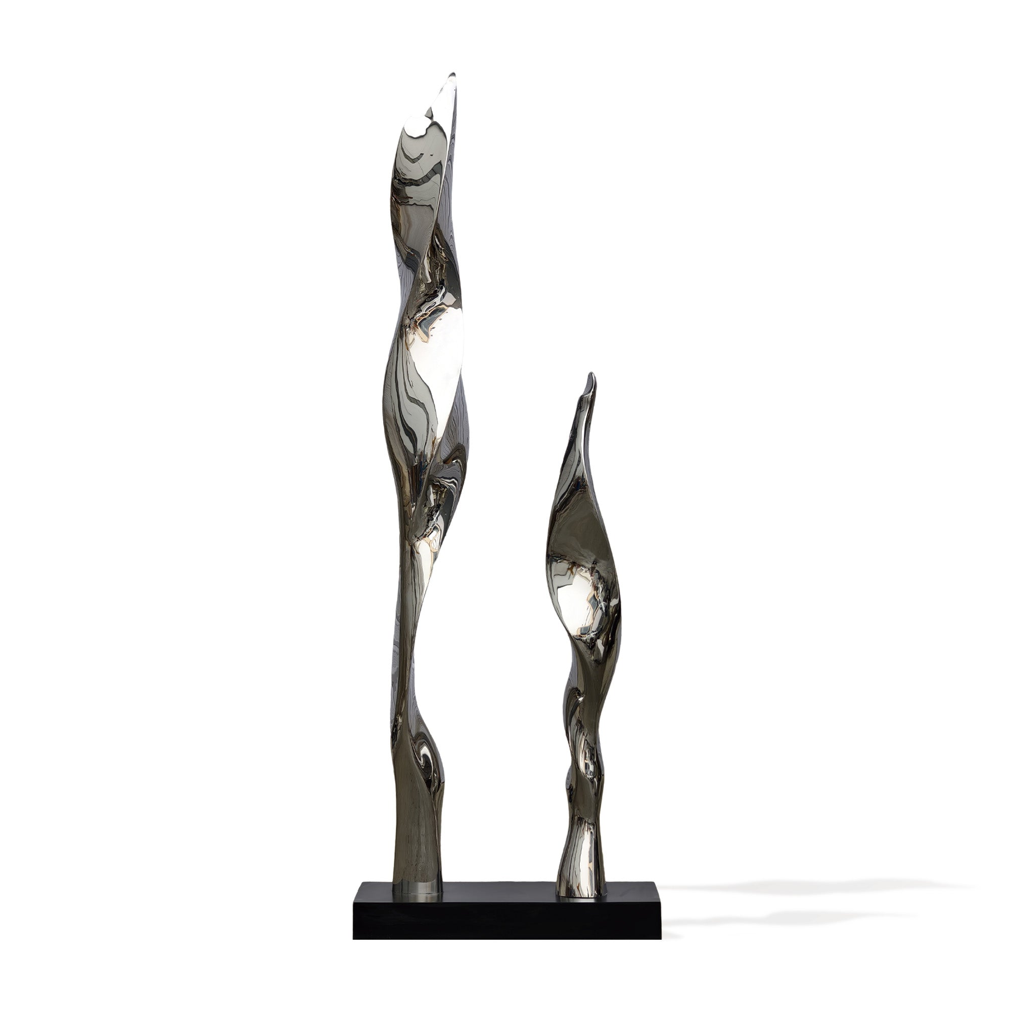Mirror-finish stainless steel abstract sculpture with twisting curves, displayed on a black base, showcasing a modern design that adds elegance to any interior.