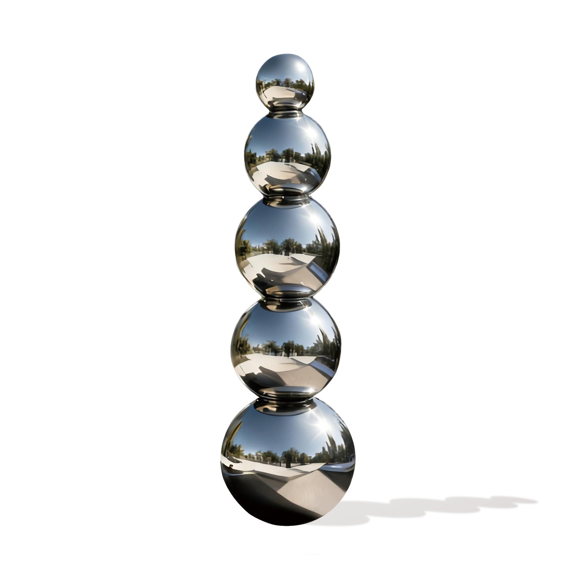 Stack of reflective silver spheres on a white background