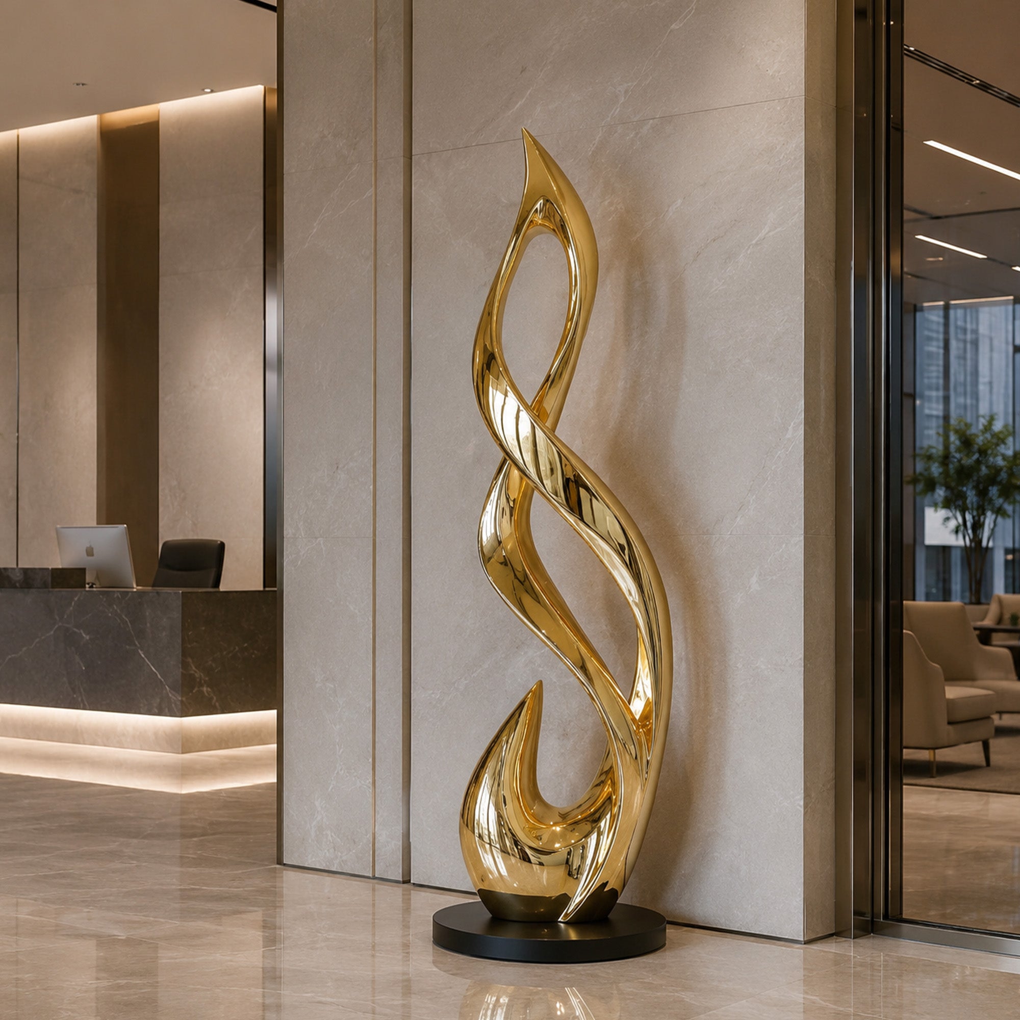 Gold stainless steel flame sculpture displayed in a luxury lobby beside a marble wall with flowing curves, mirror polished finish, open center form, and black round base.