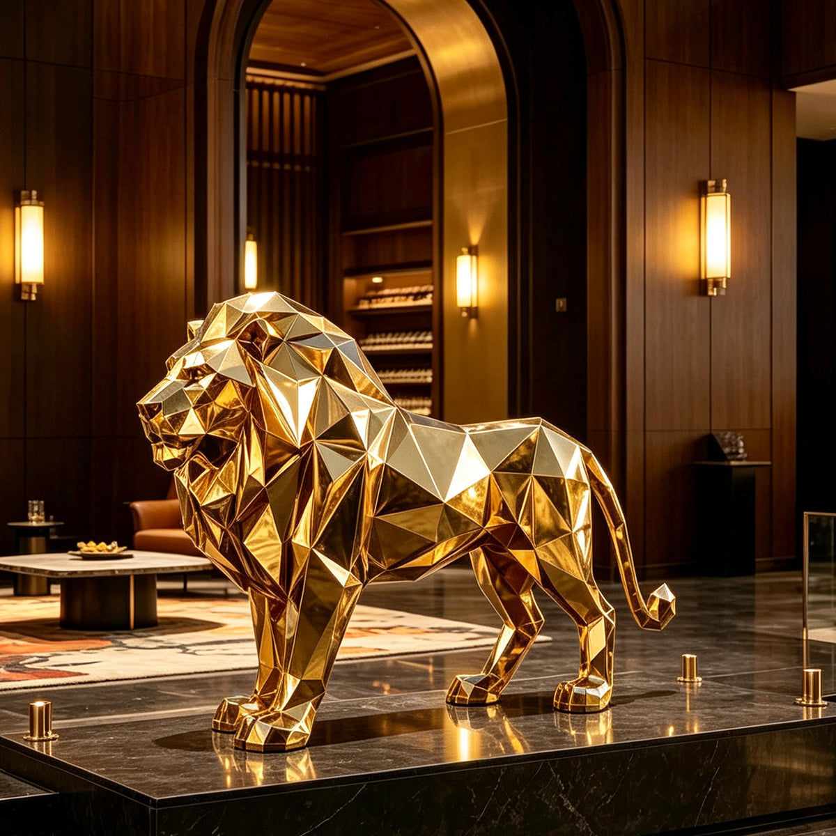 Reflective gold stainless steel lion sculpture designed with angular geometric facets, displayed on a black stone platform in a luxurious dark wood interior.