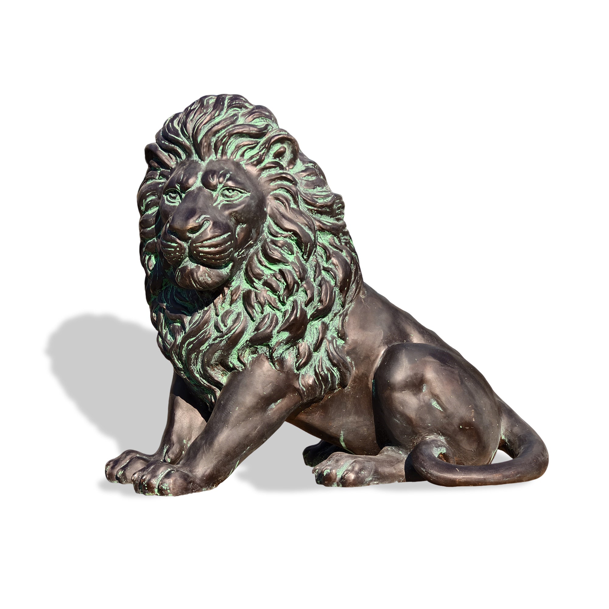 Side view of a bronze lion sculpture with detailed mane, sitting gracefully.