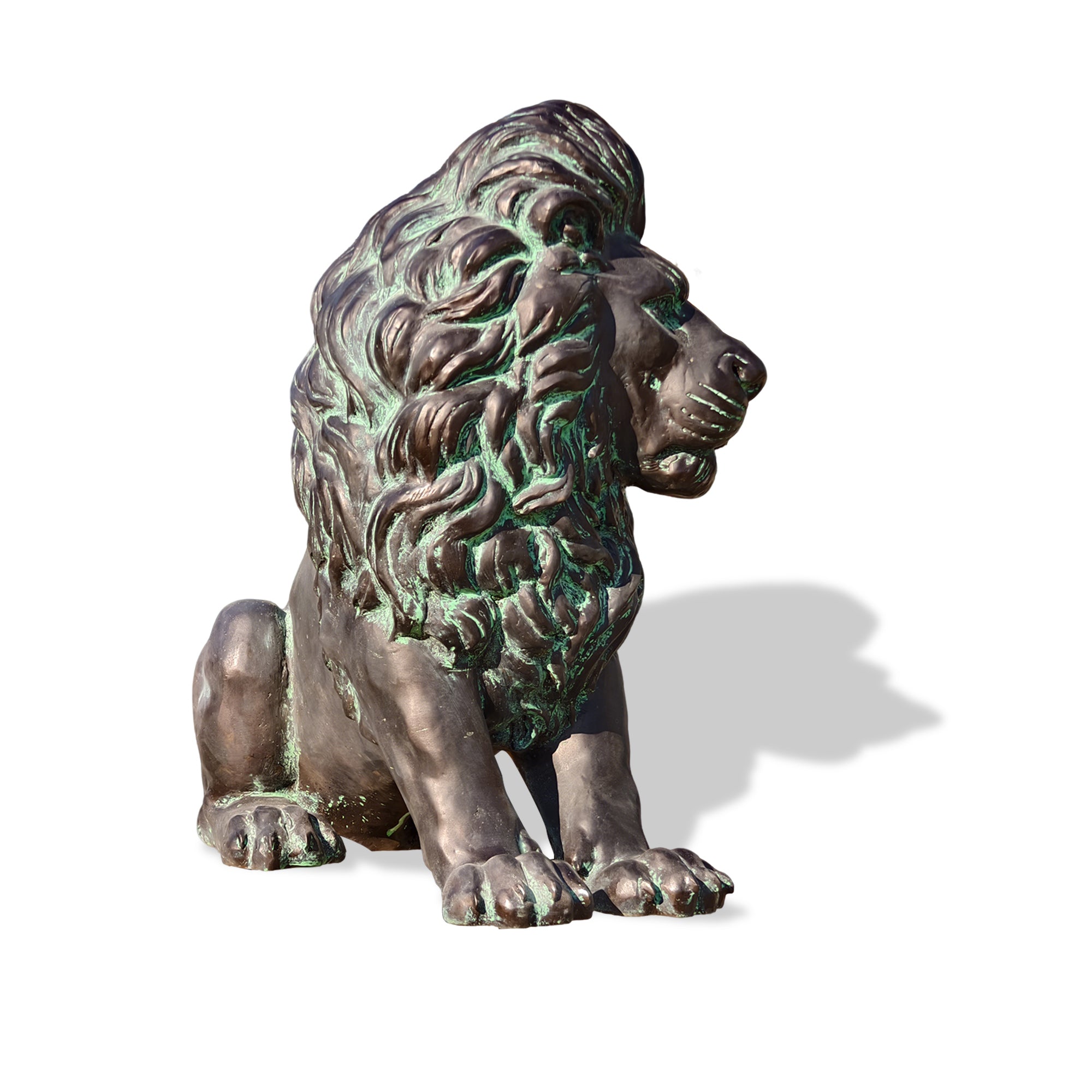Studio shot of a detailed bronze lion sculpture with green patina.