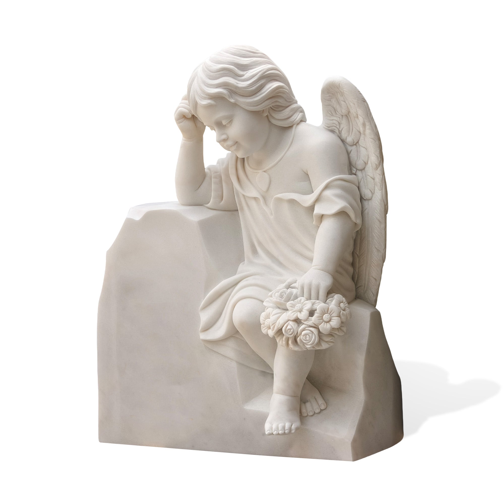Hand-carved white marble angel statue seated on stone, holding floral bouquet, ideal for memorial gardens