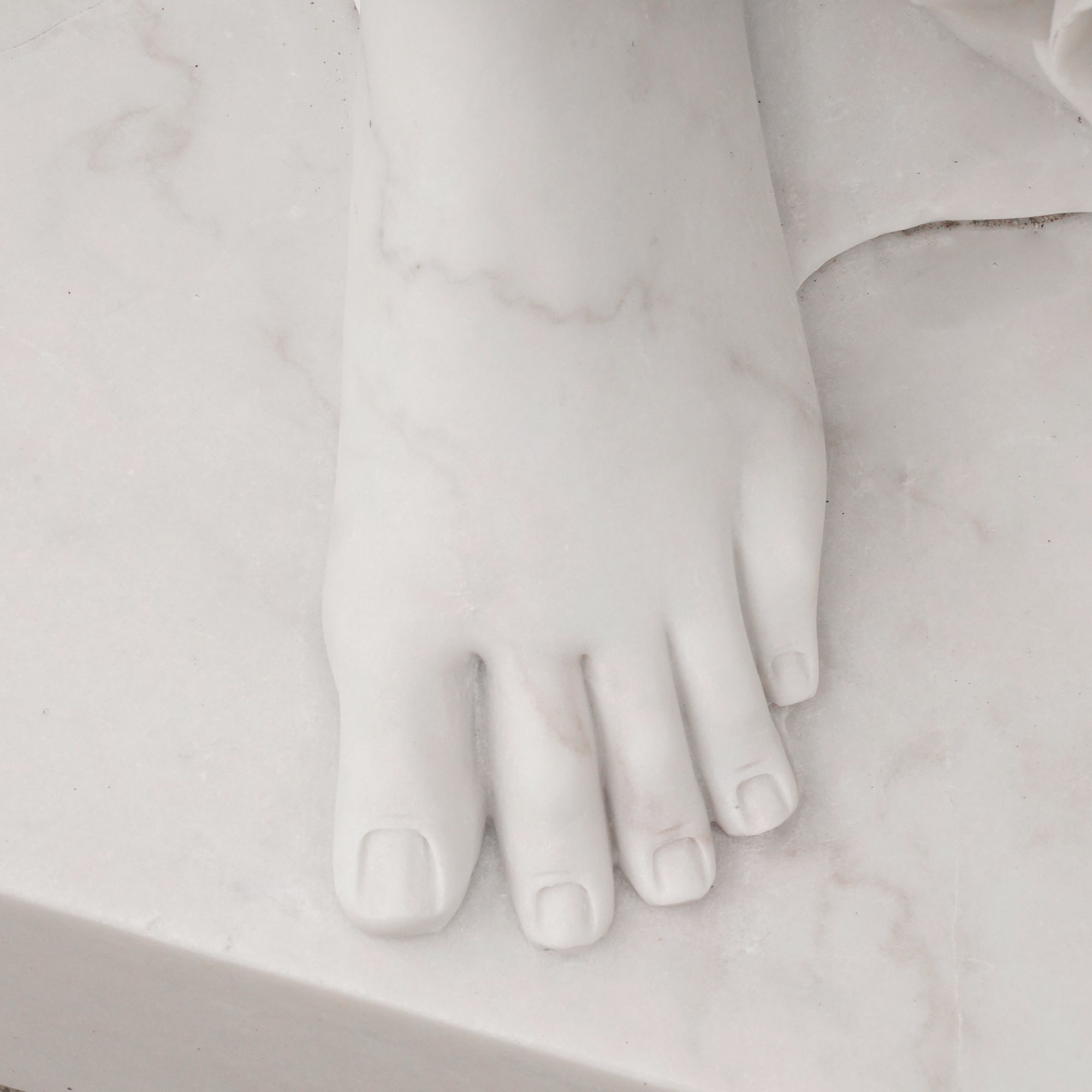 Close-up of the Music and Inspiration replica sculpture, hand-carved in marble to capture the serene beauty of Bistolfi’s original work in Mexico.