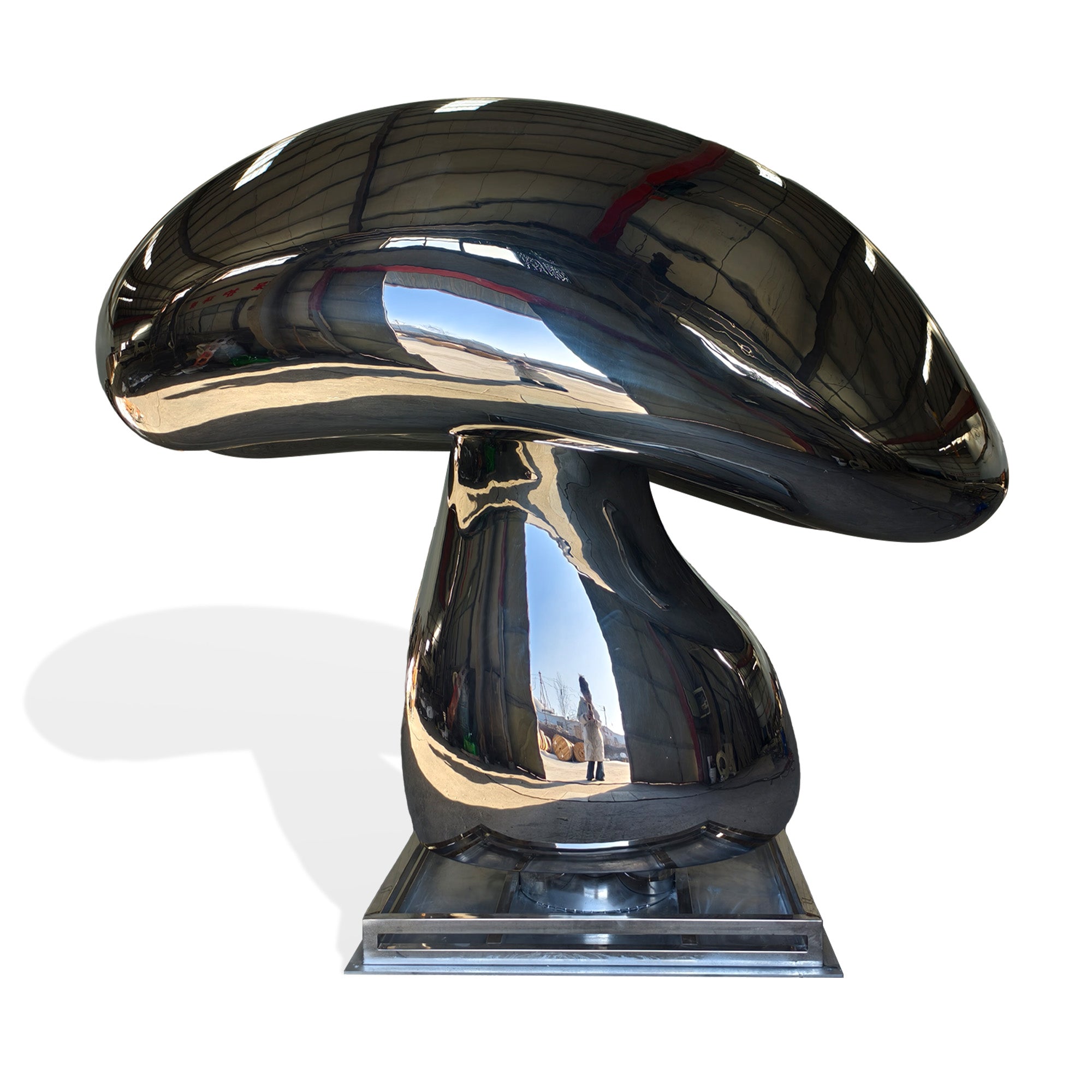Front view of giant mirror polished stainless steel mushroom sculpture, custom outdoor lawn art on metal base, white background.