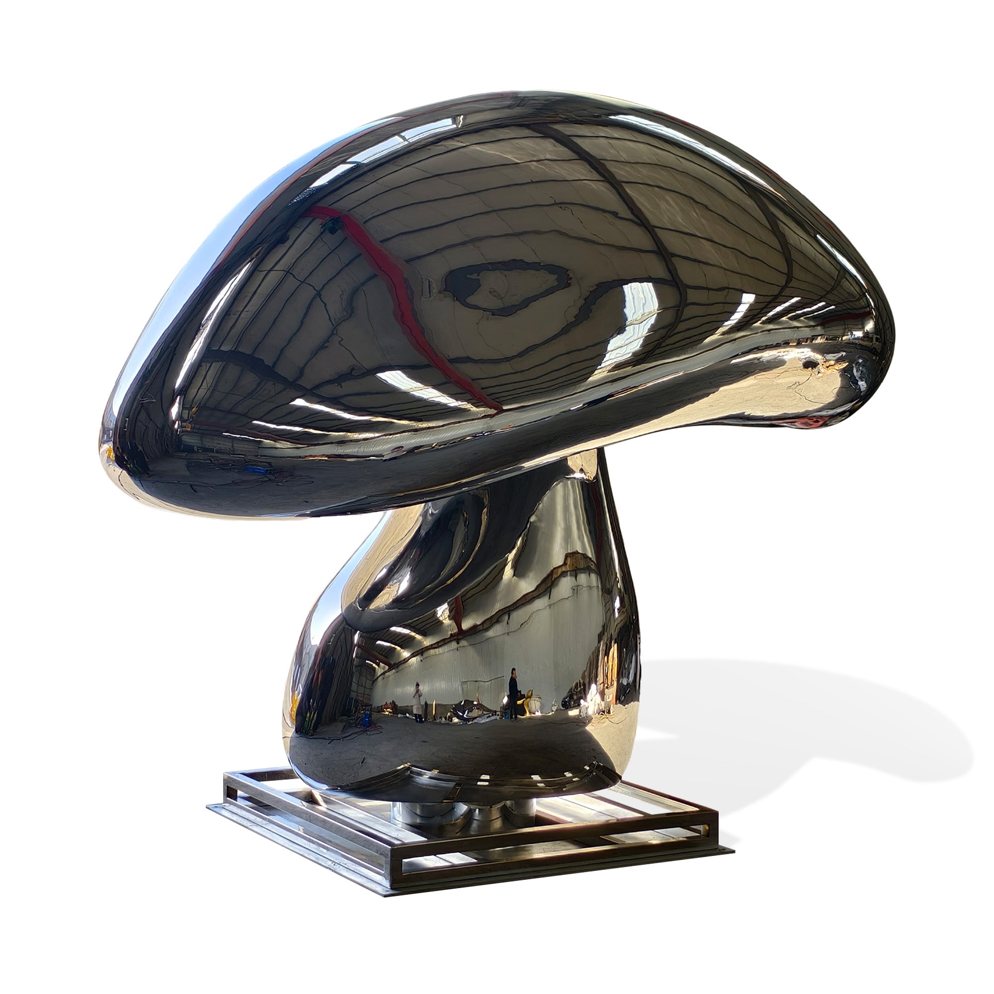 Side view of custom giant stainless steel mushroom lawn sculpture with mirror finish, large-scale outdoor garden and park art.