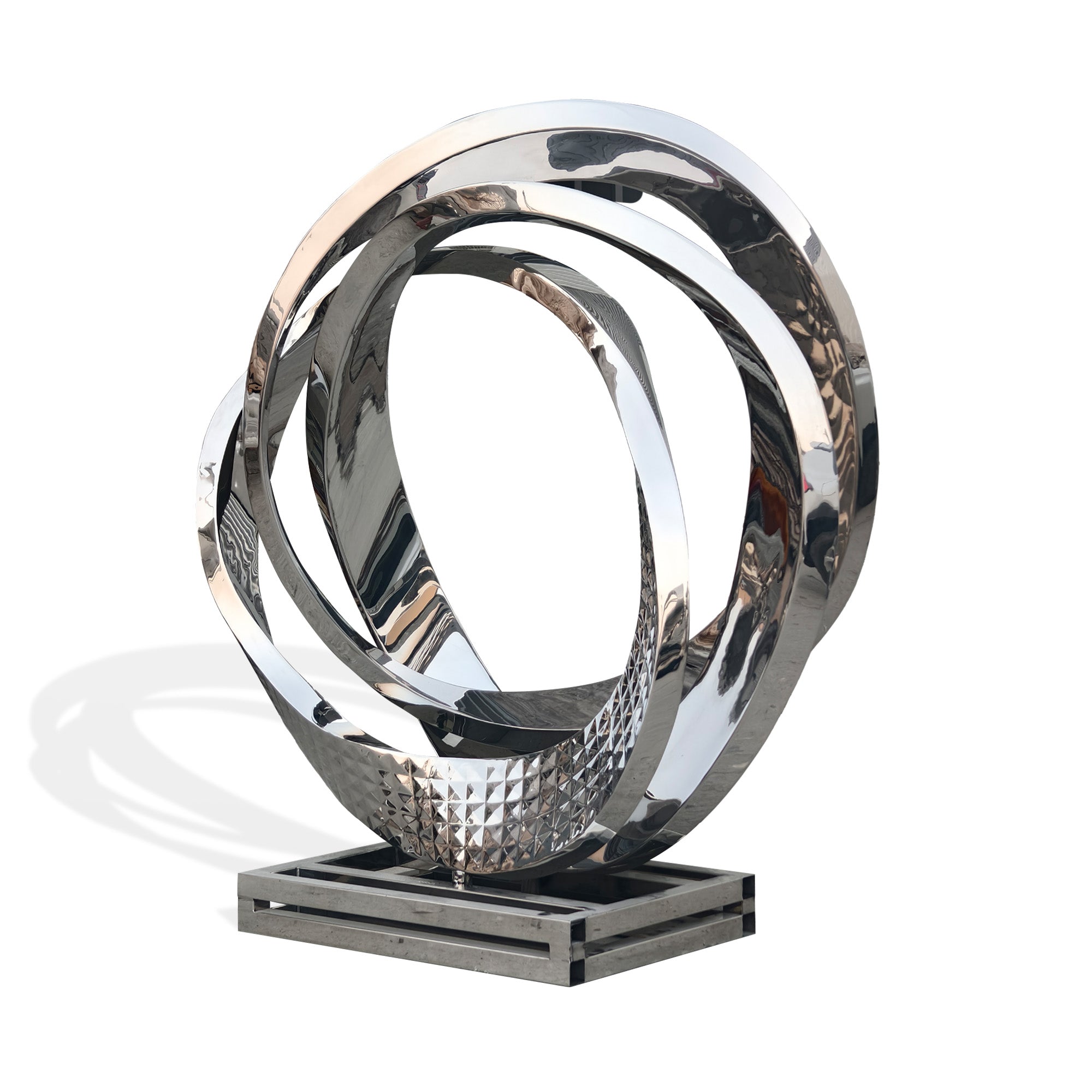 Mirror polished cast stainless steel abstract ring sculpture with interlocking loops and textured detail, modern statement art on metal base, white background.