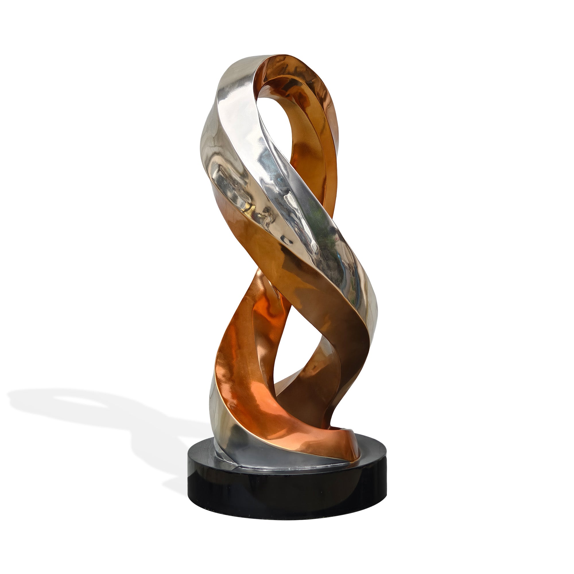 Front view of custom electroplated stainless steel abstract ribbon sculpture with gold and silver finish, luxury interior decor on round base.