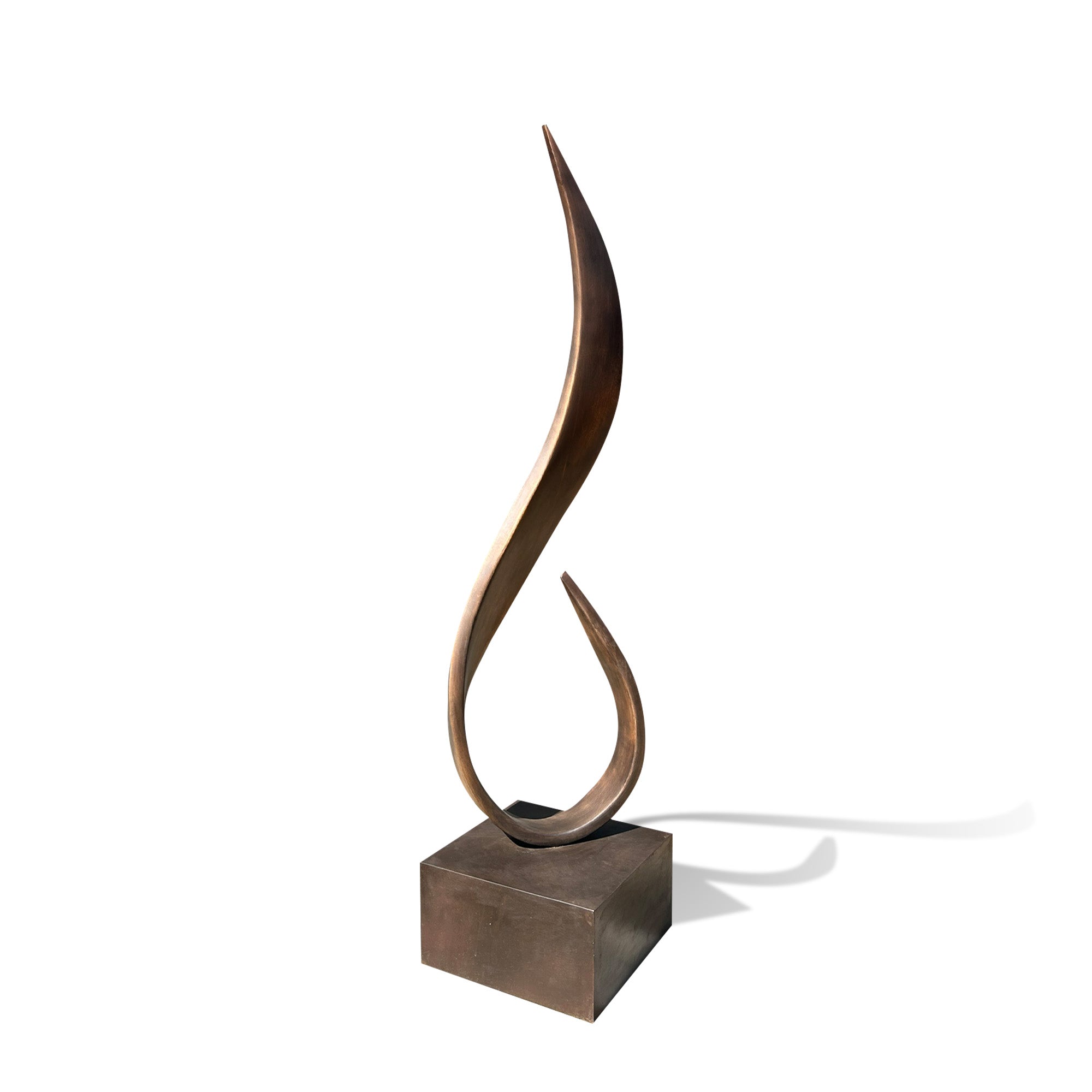Abstract bronze sculpture on a white background