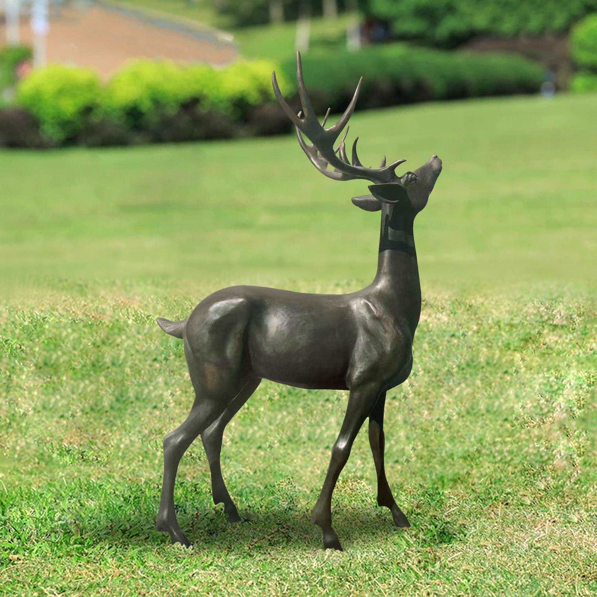 garden ornaments bronze elk standing on the lawn