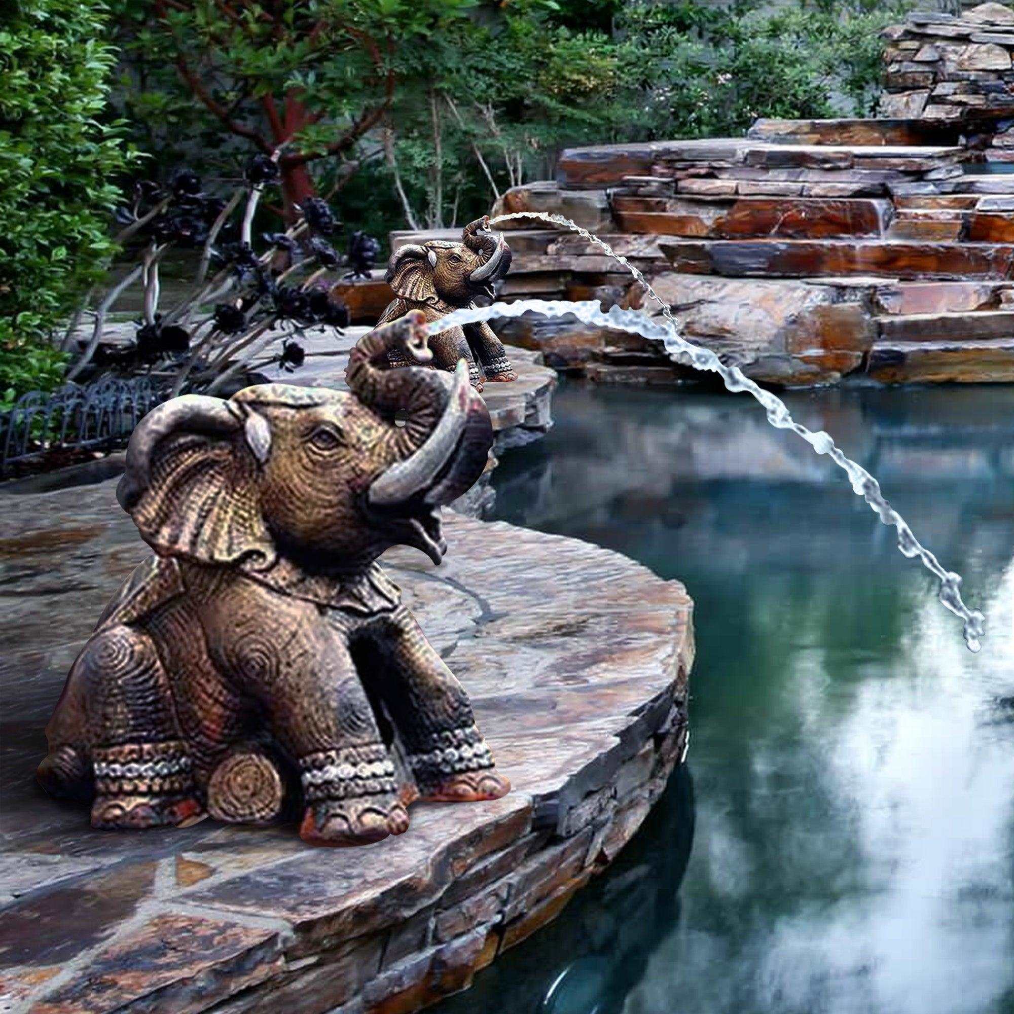 elephant fountain bronze sculpture artwork  beside the pool