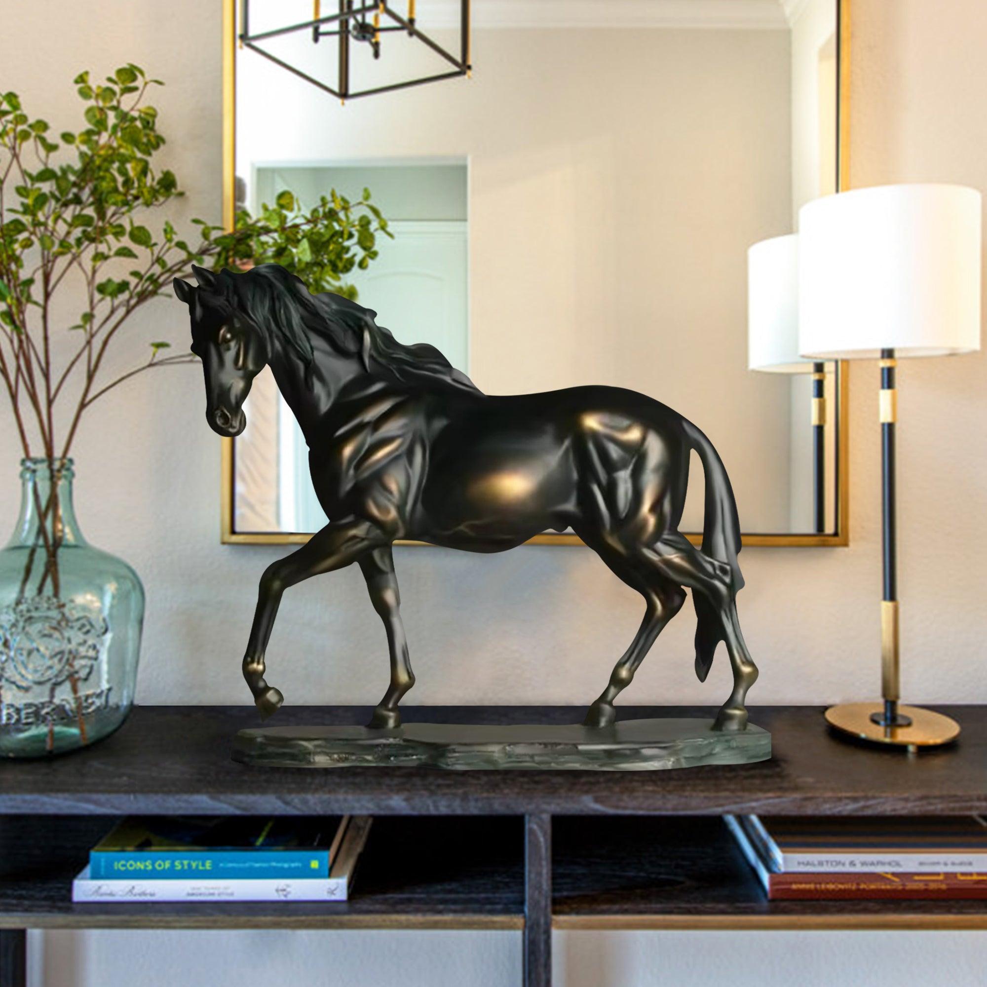 black bronze horse sculpture on desk