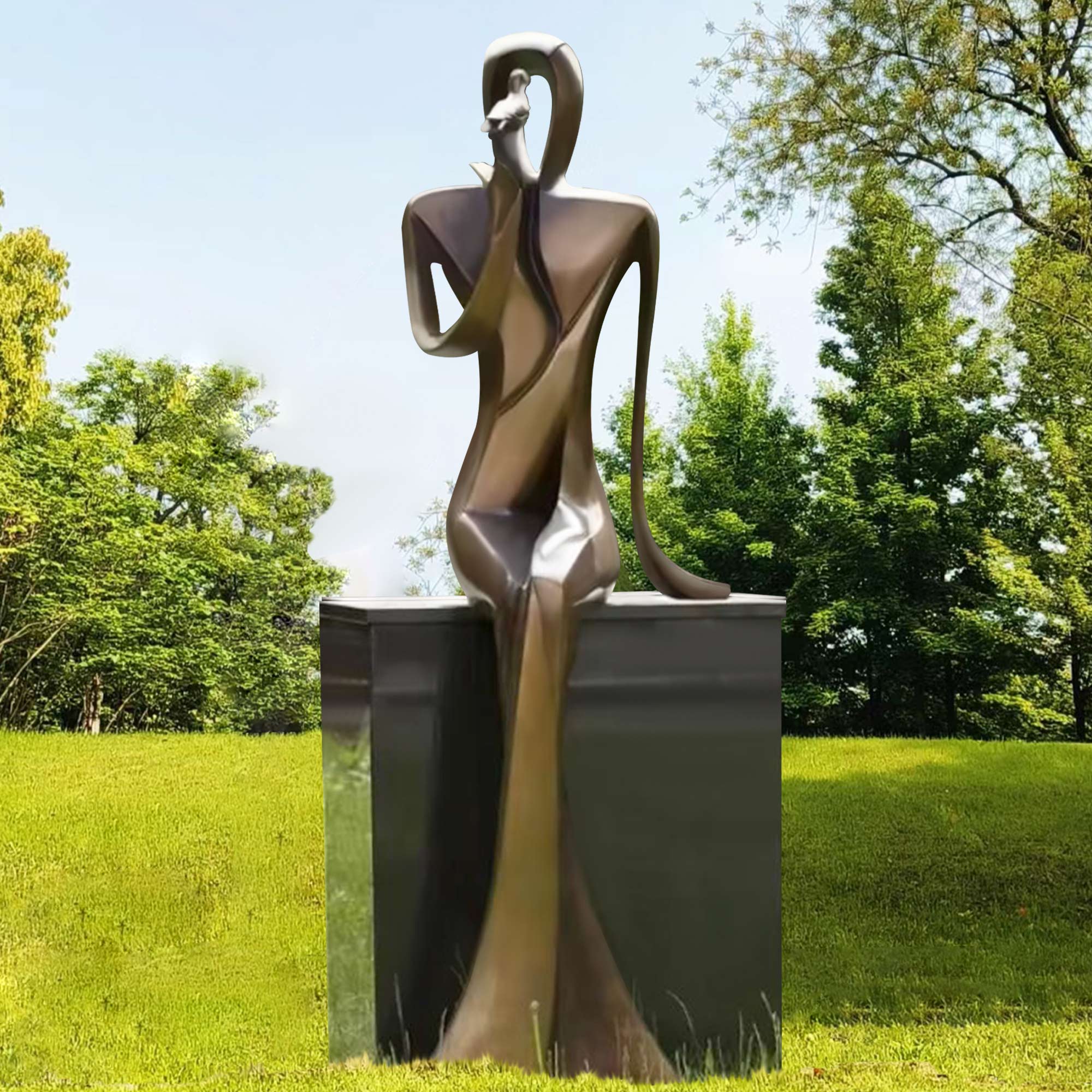 garden sculpture abstract sitting human figure art on lush green lawn