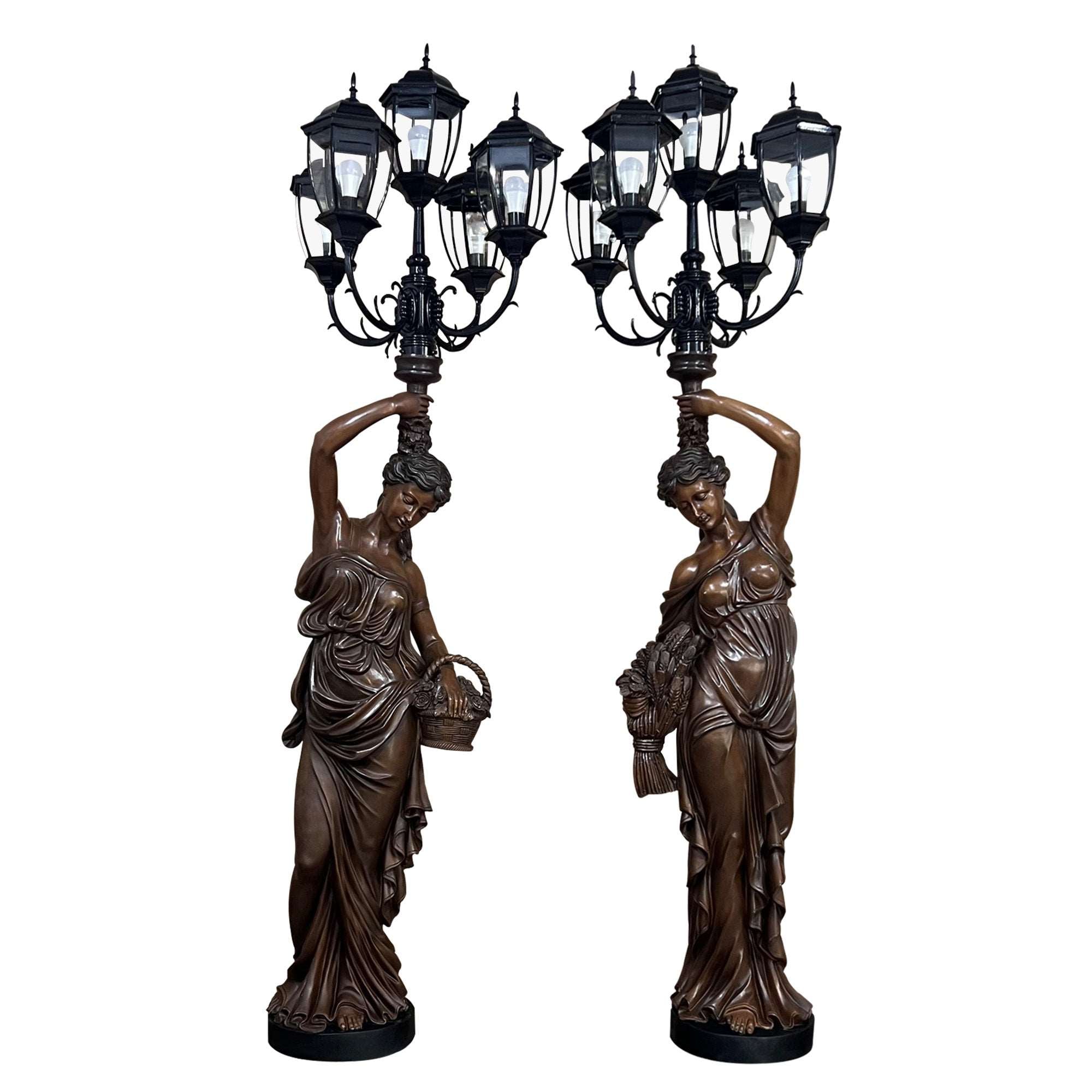 Pair of bronze lady sculptures with integrated LED lamp posts