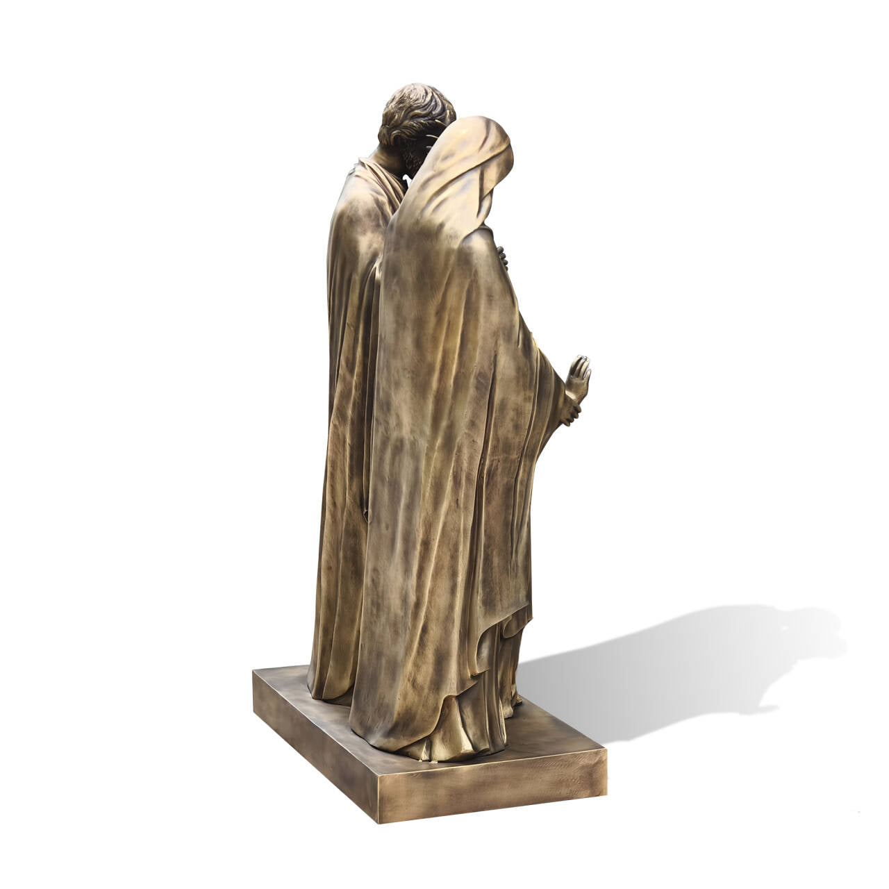 Back view of antique bronze Holy Family sculpture with robes