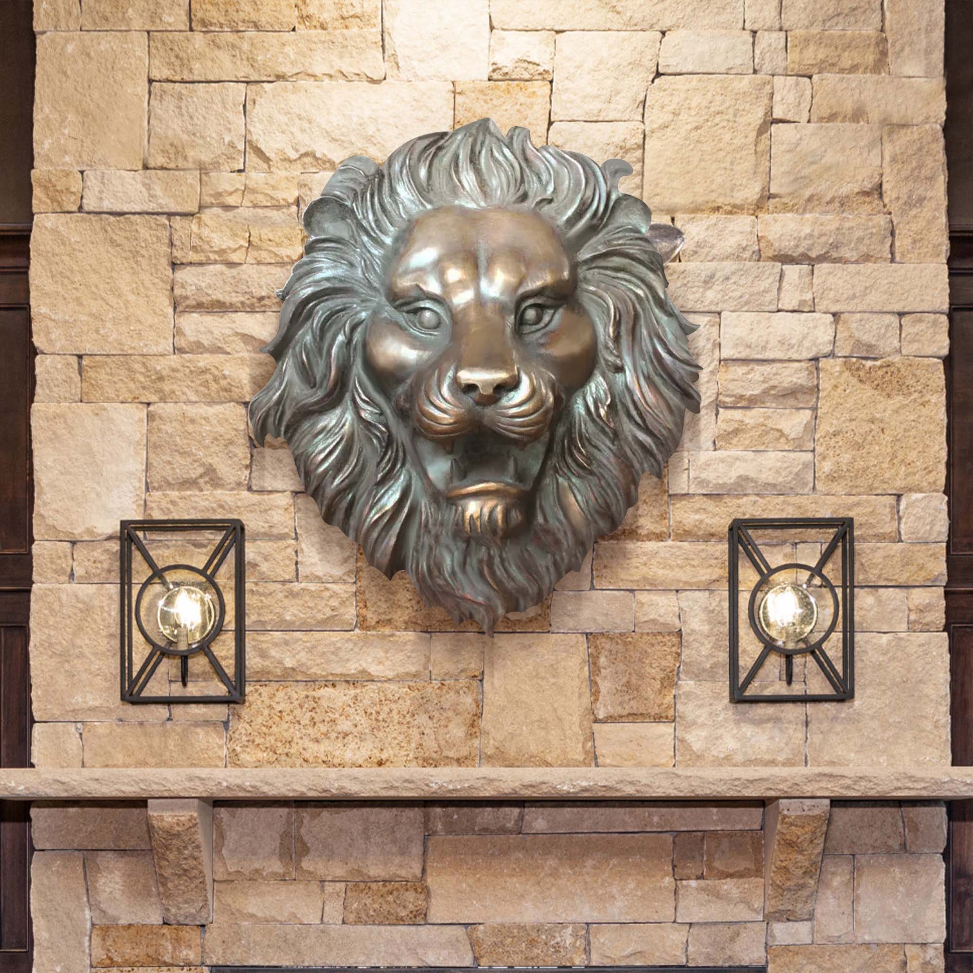 Bronze lion head wall sculpture with an antique patina finish, mounted above a fireplace in a luxurious stone interior.