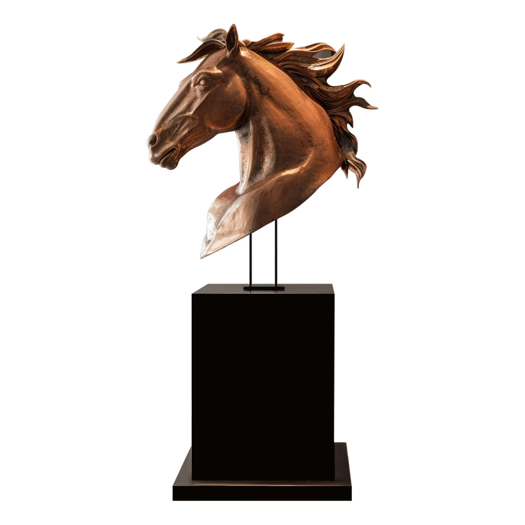 Modern indoor bronze horse head sculpture with a polished finish on a black marble base