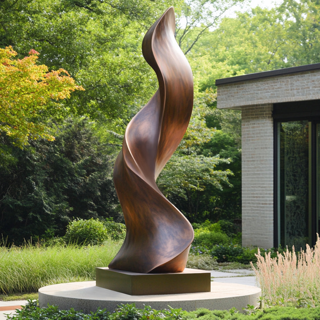  Flame of Serenity abstract bronze sculpture with twisting form, polished antique finish, placed in a modern outdoor garden.