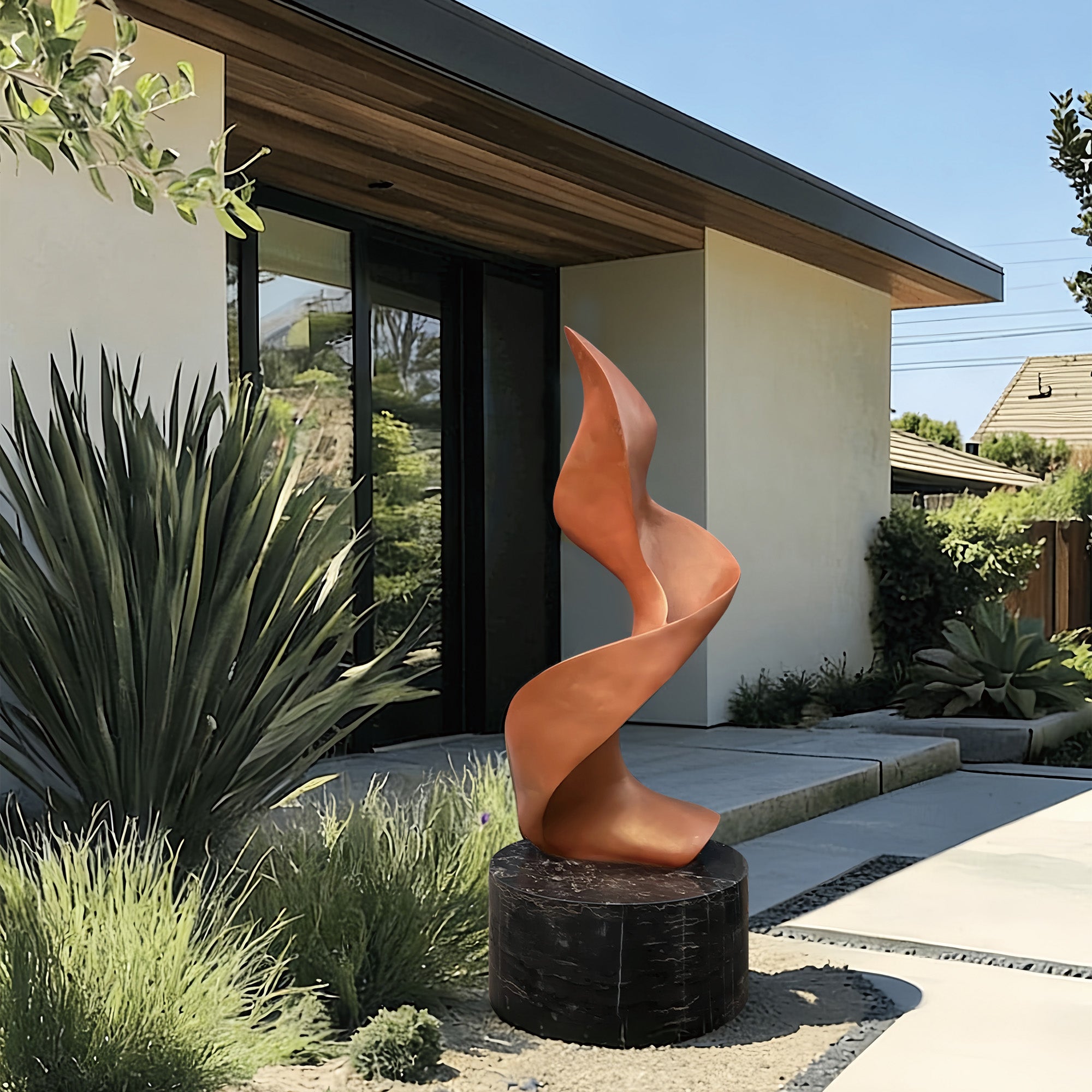 Bronze spiral sculpture displayed outdoors in a modern estate, creating a dynamic and elegant focal point 