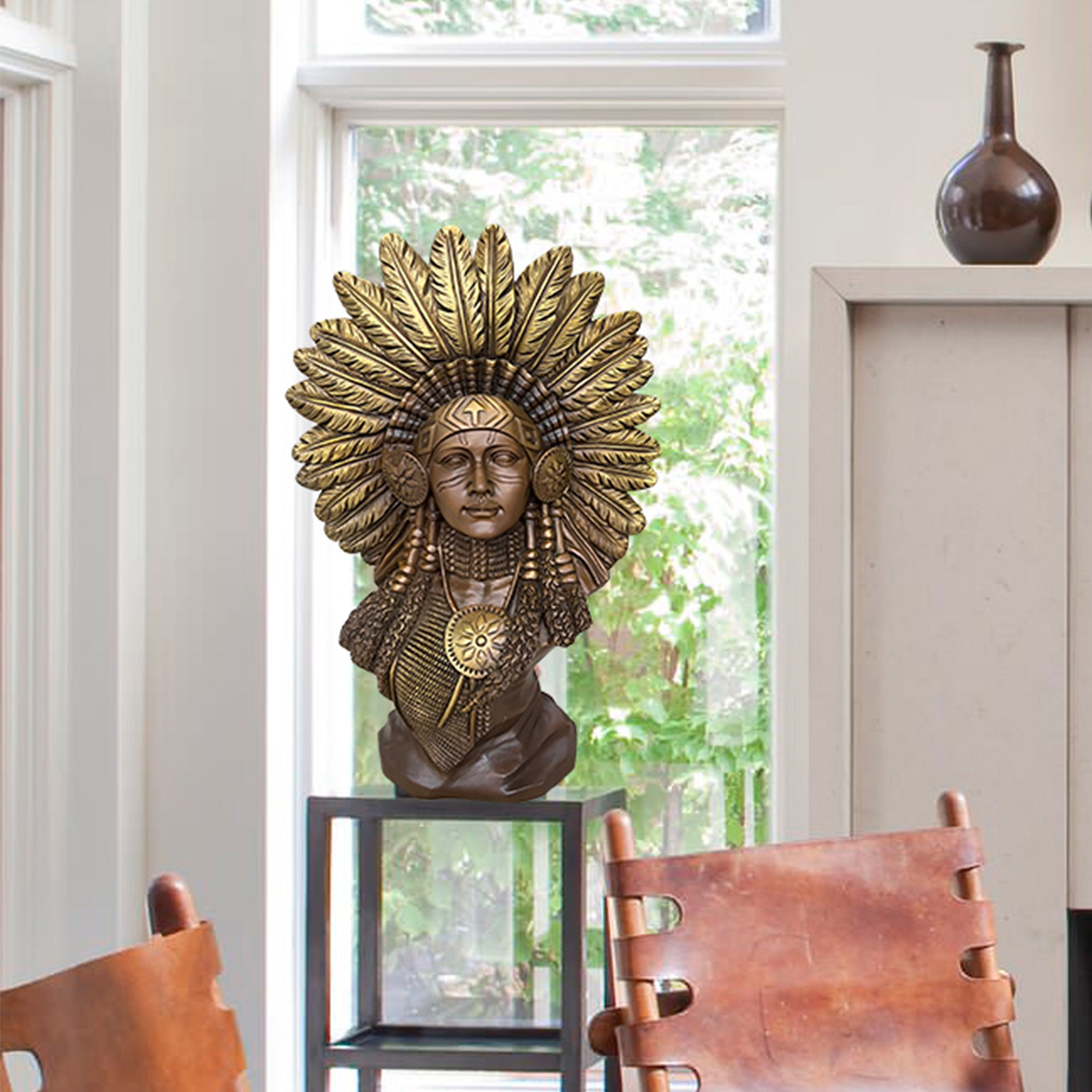 Bronze bust sculpture of Native American woman with ceremonial headdress and braided hair, handcrafted in traditional Indigenous style