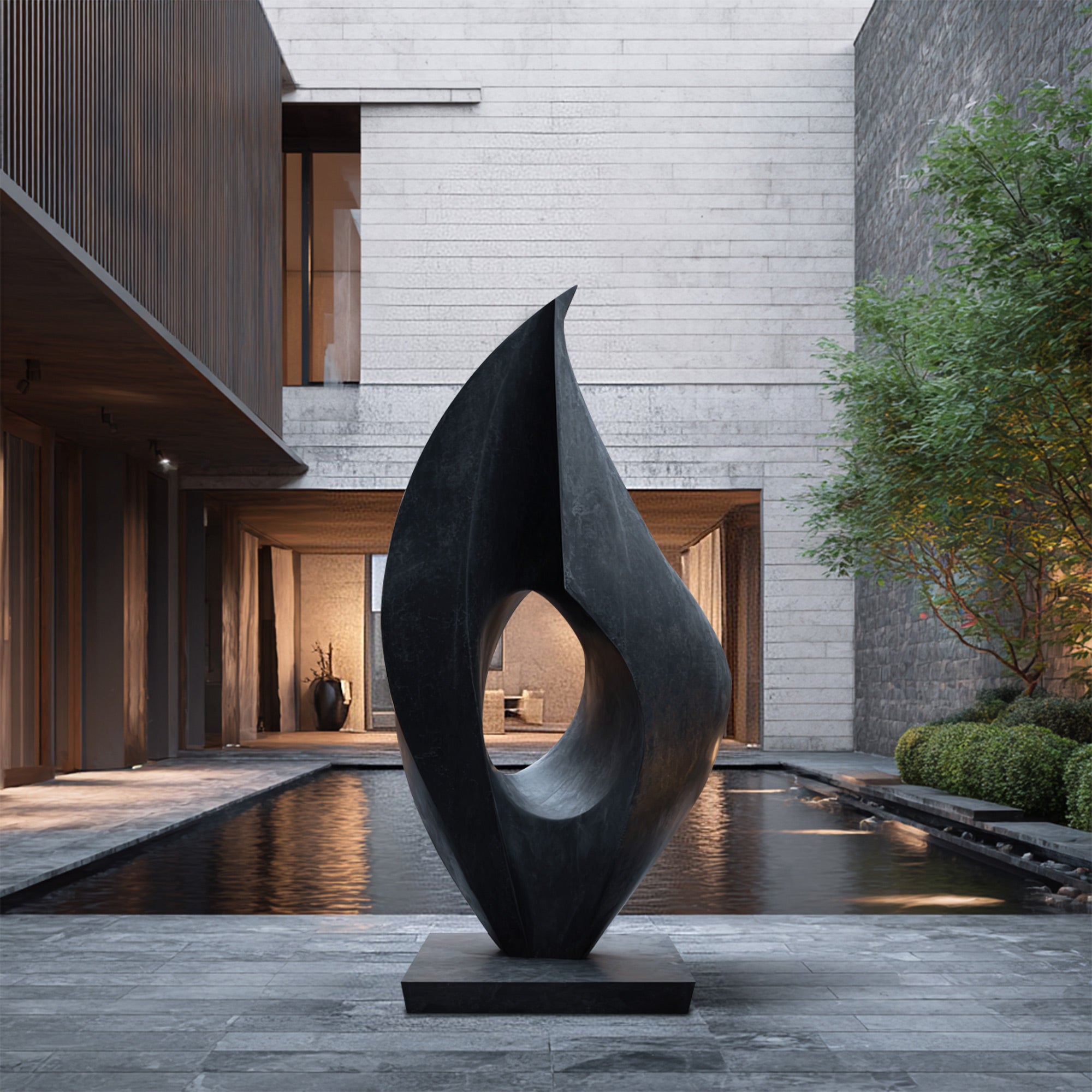 Modern bronze abstract sculpture in a courtyard with a building and water feature in the background