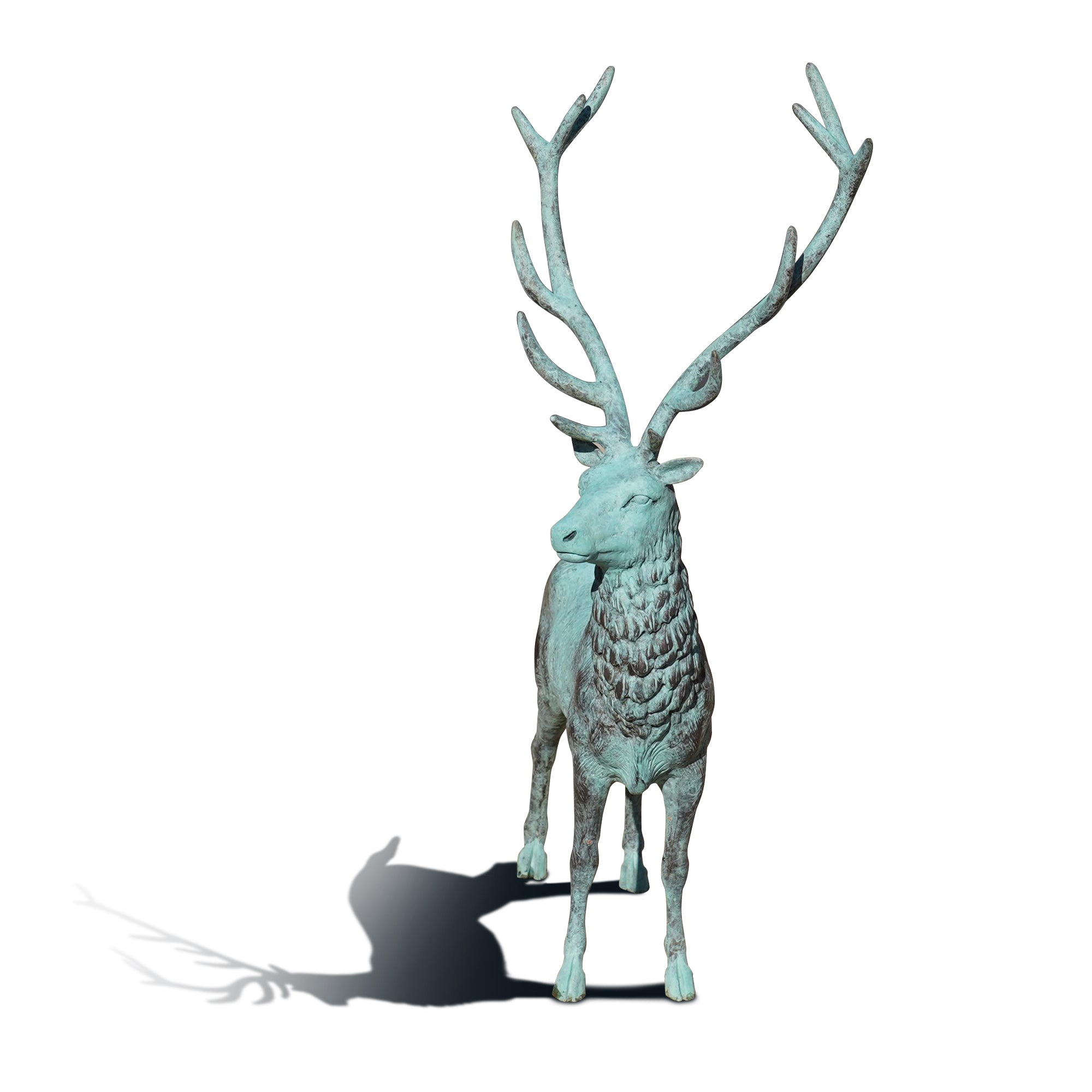 Decorative bronze deer figure with antlers on a white background