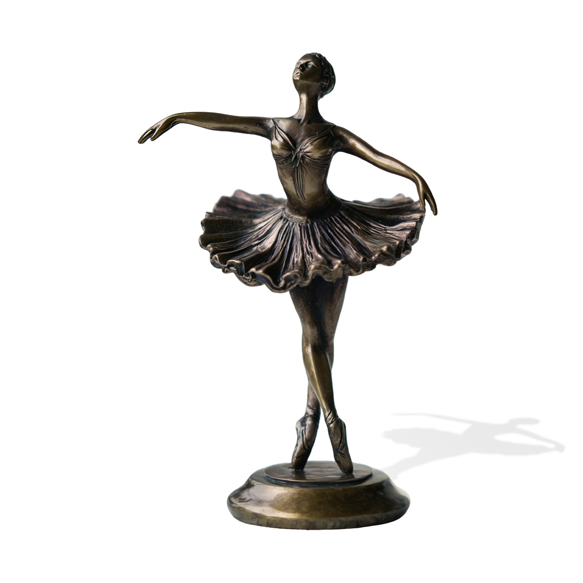 Bronze statue of a ballerina on a white background