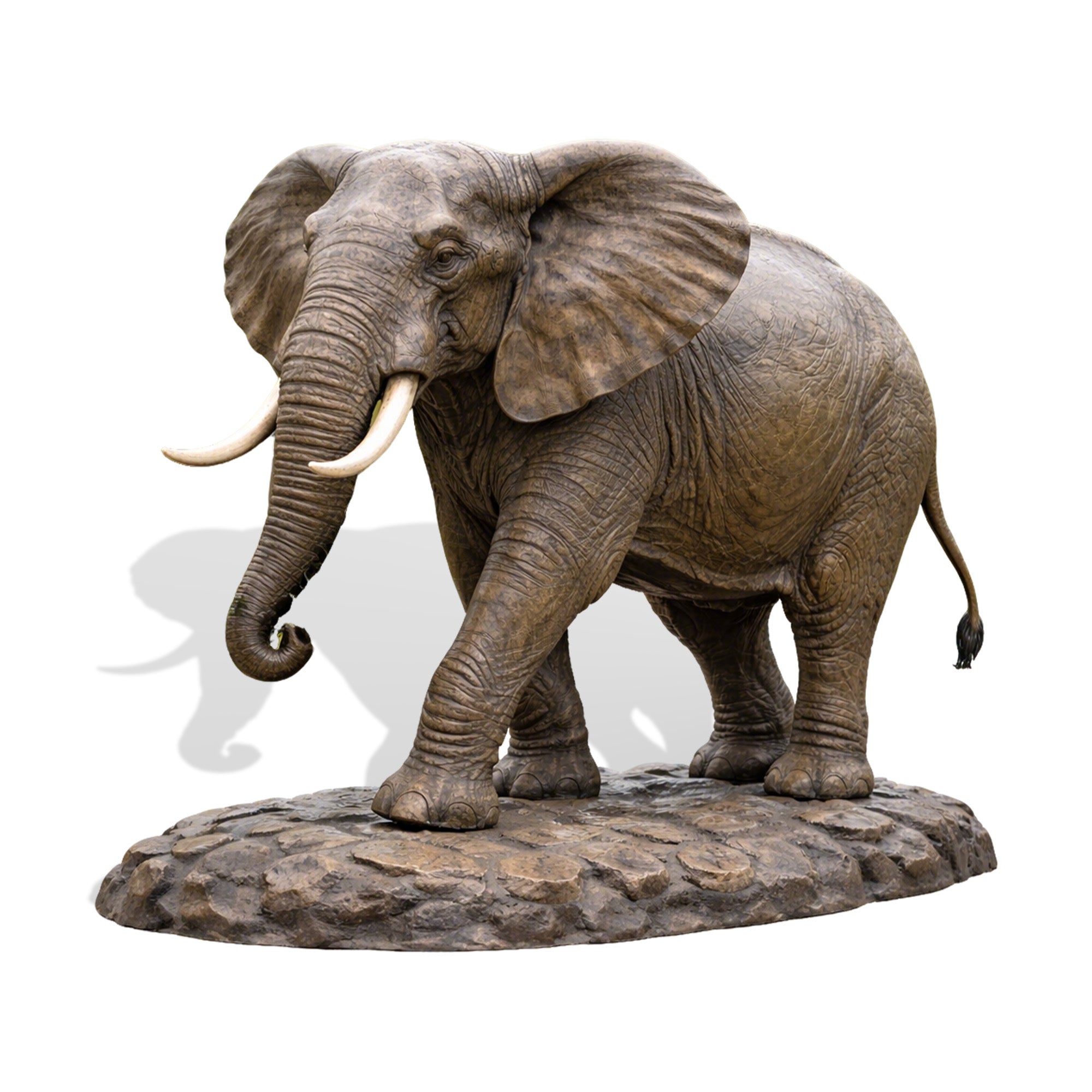 Bronze elephant statue on a white background