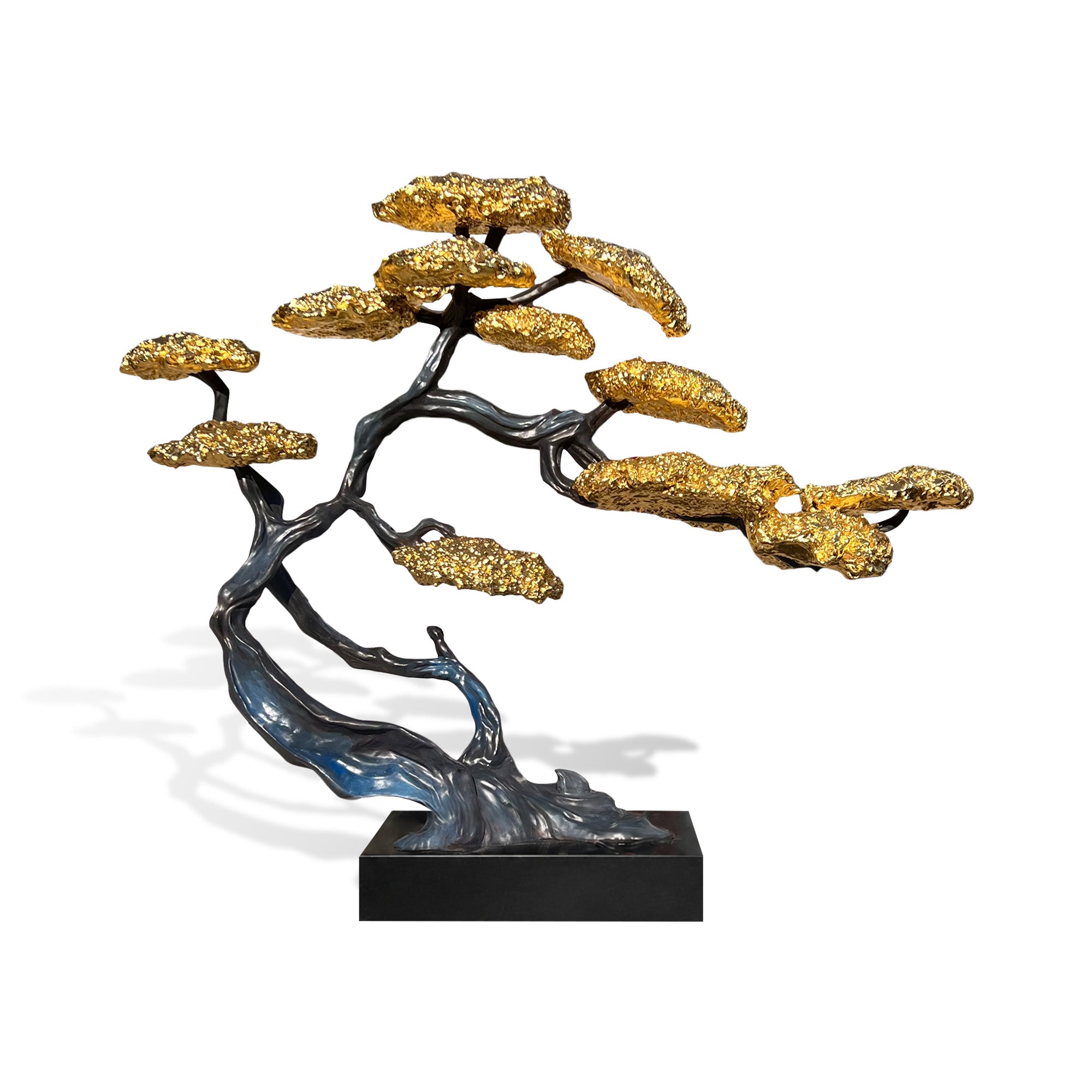Golden bloom tree bronze sculpture with dark flowing branches, textured gold blossom canopy, and black base on white background
