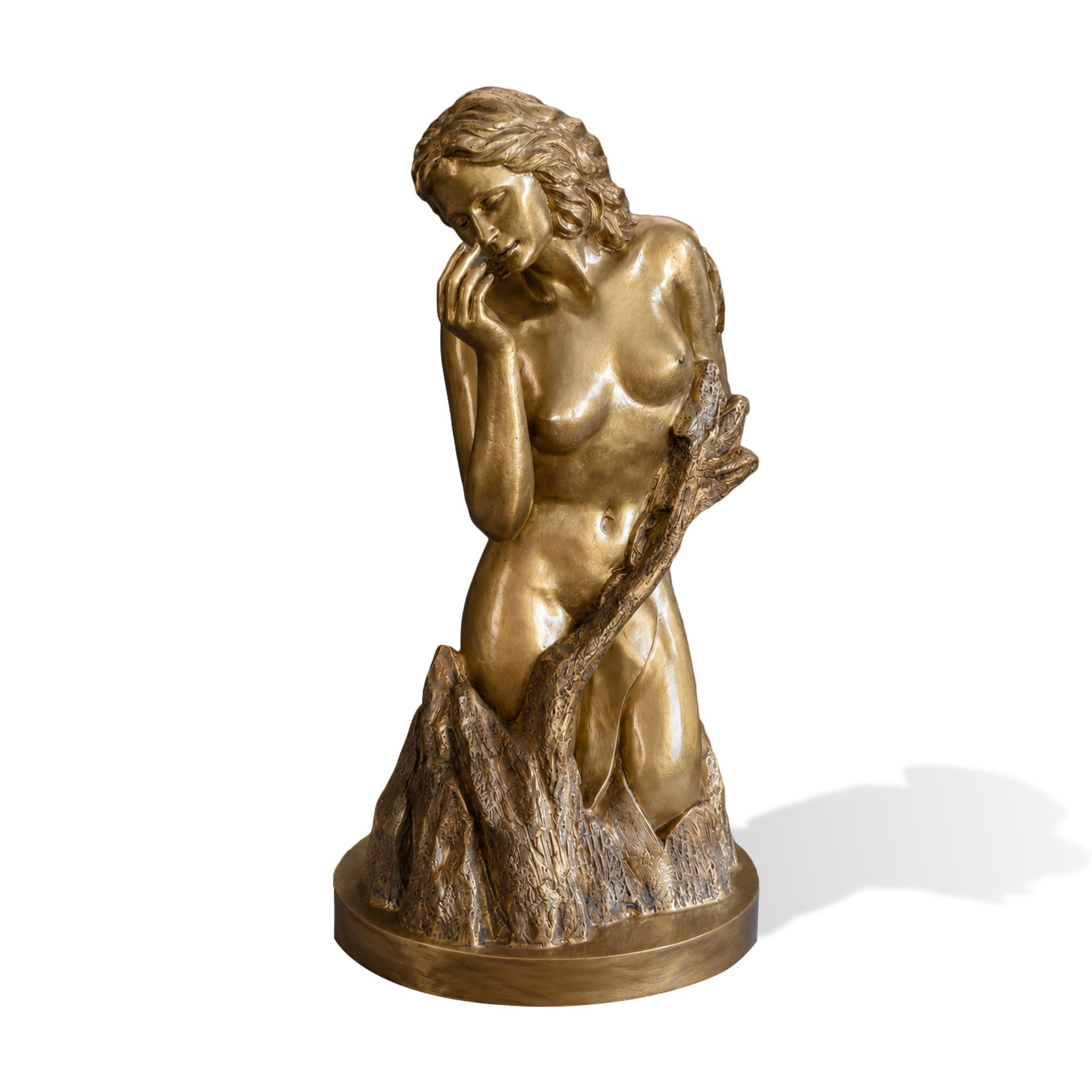 Elegant bronze woman sculpture with lowered gaze and reflective pose.