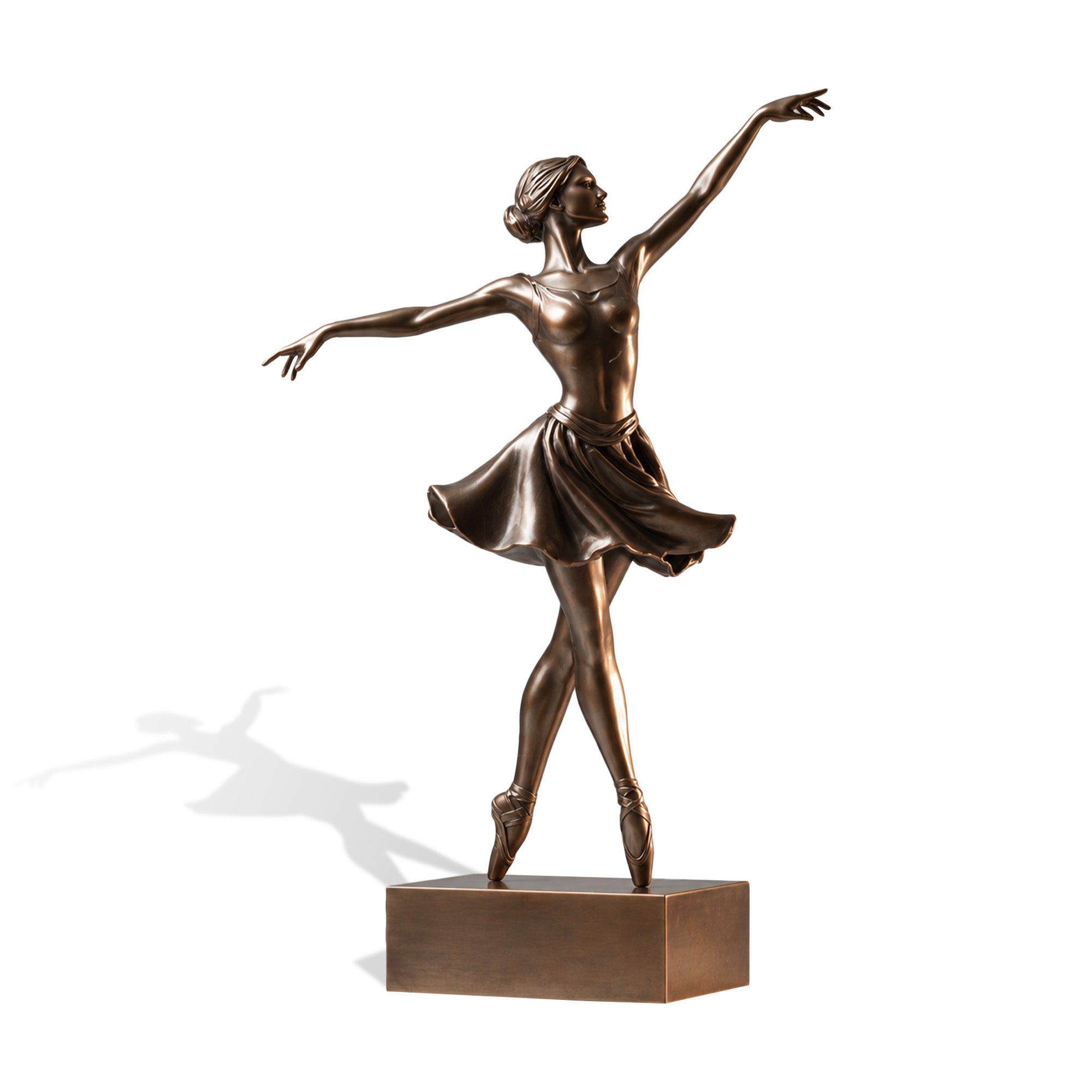 Elegant bronze ballet dancer sculpture standing en pointe with crossed legs, outstretched arms, and flowing skirt