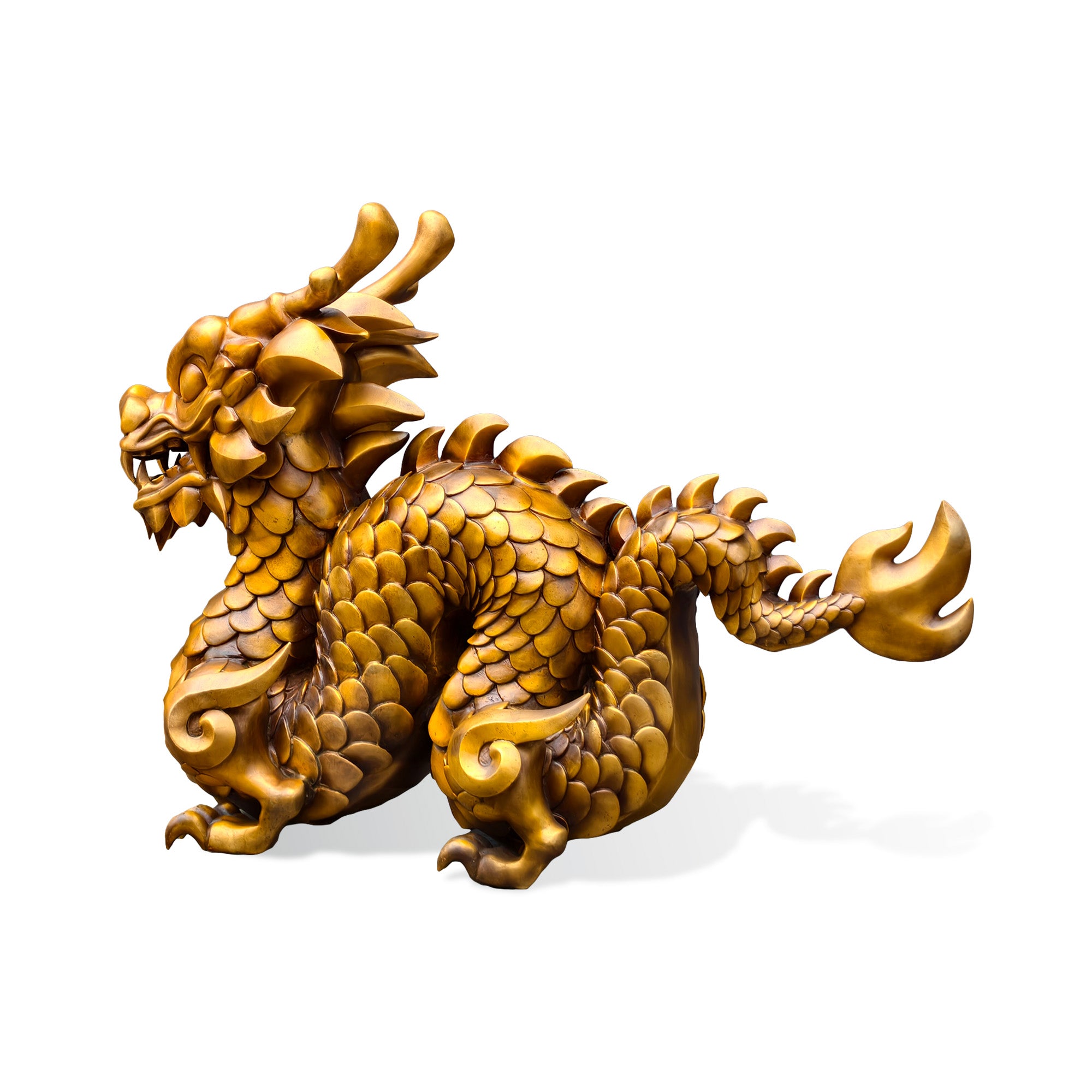 Side profile view of a golden bronze zodiac dragon statue with a coiled body, detailed scales, raised horns, flame-shaped tail, and traditional Chinese zodiac symbolism on a white background.