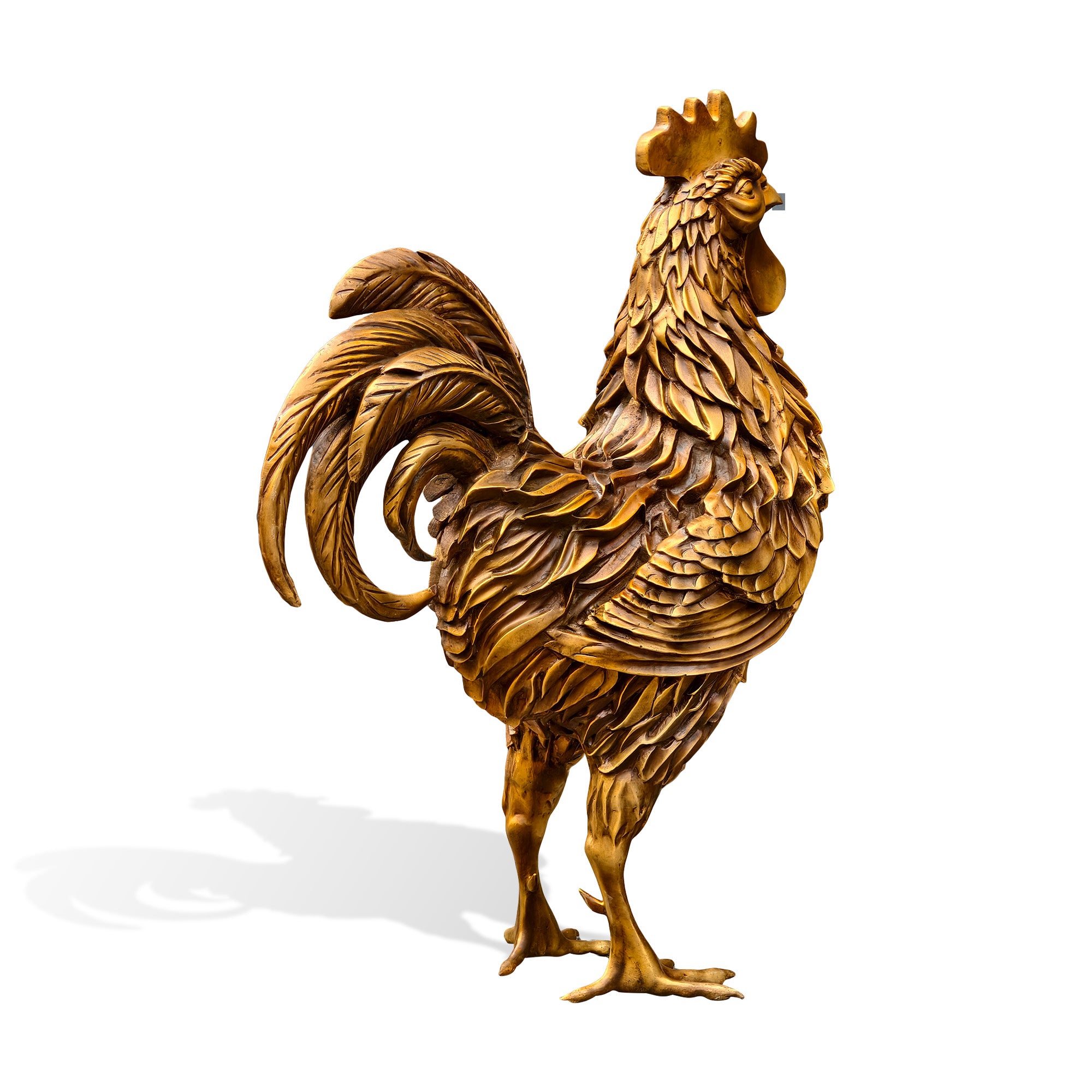 Front three-quarter view of a golden bronze rooster sculpture with Chinese zodiac symbolism, layered feathers, raised comb, full chest, curved tail, and slender legs on a white background.