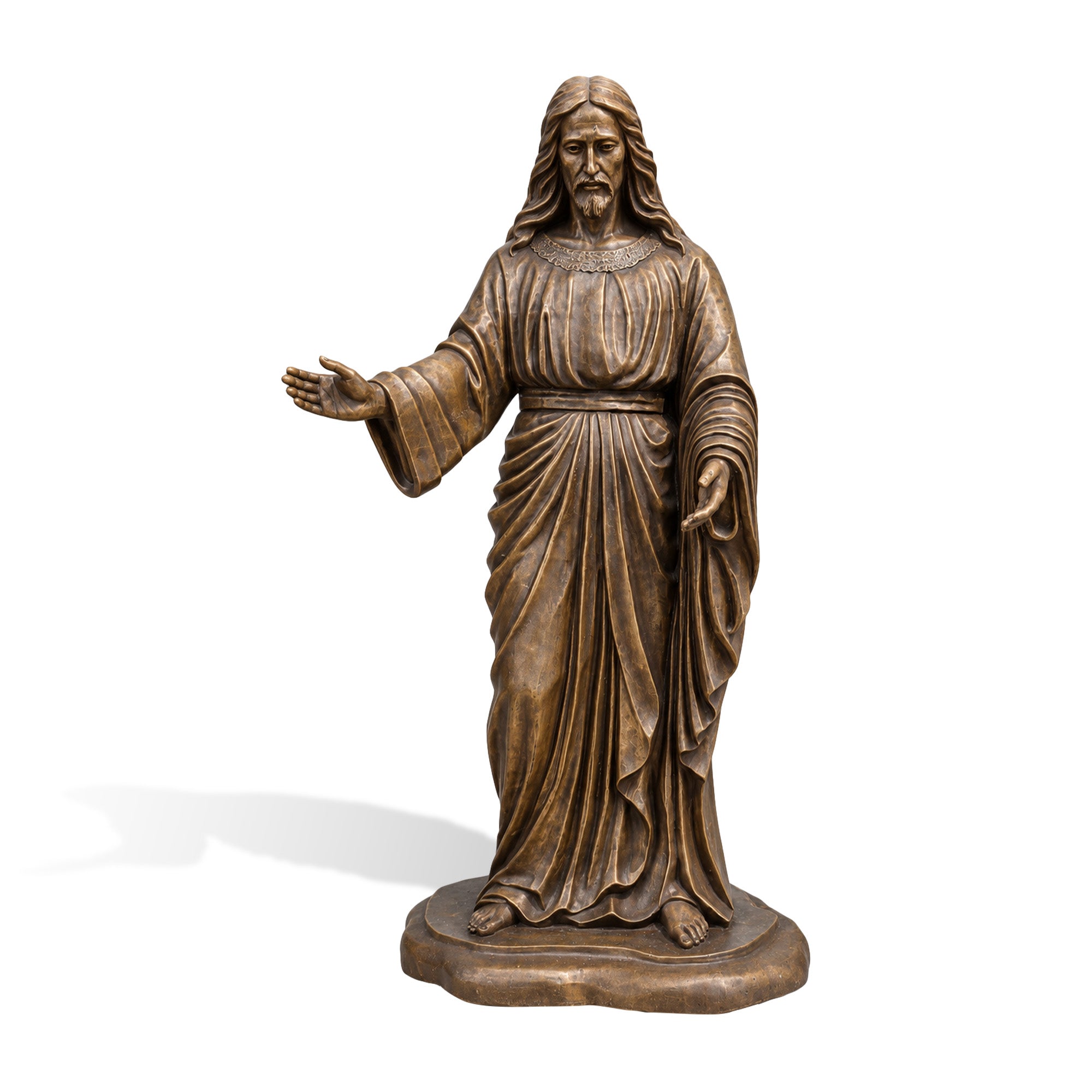 Front view of a bronze Jesus Christ religious statue with open arms, long hair, flowing robe details, calm facial expression, and oval base on a white background.
