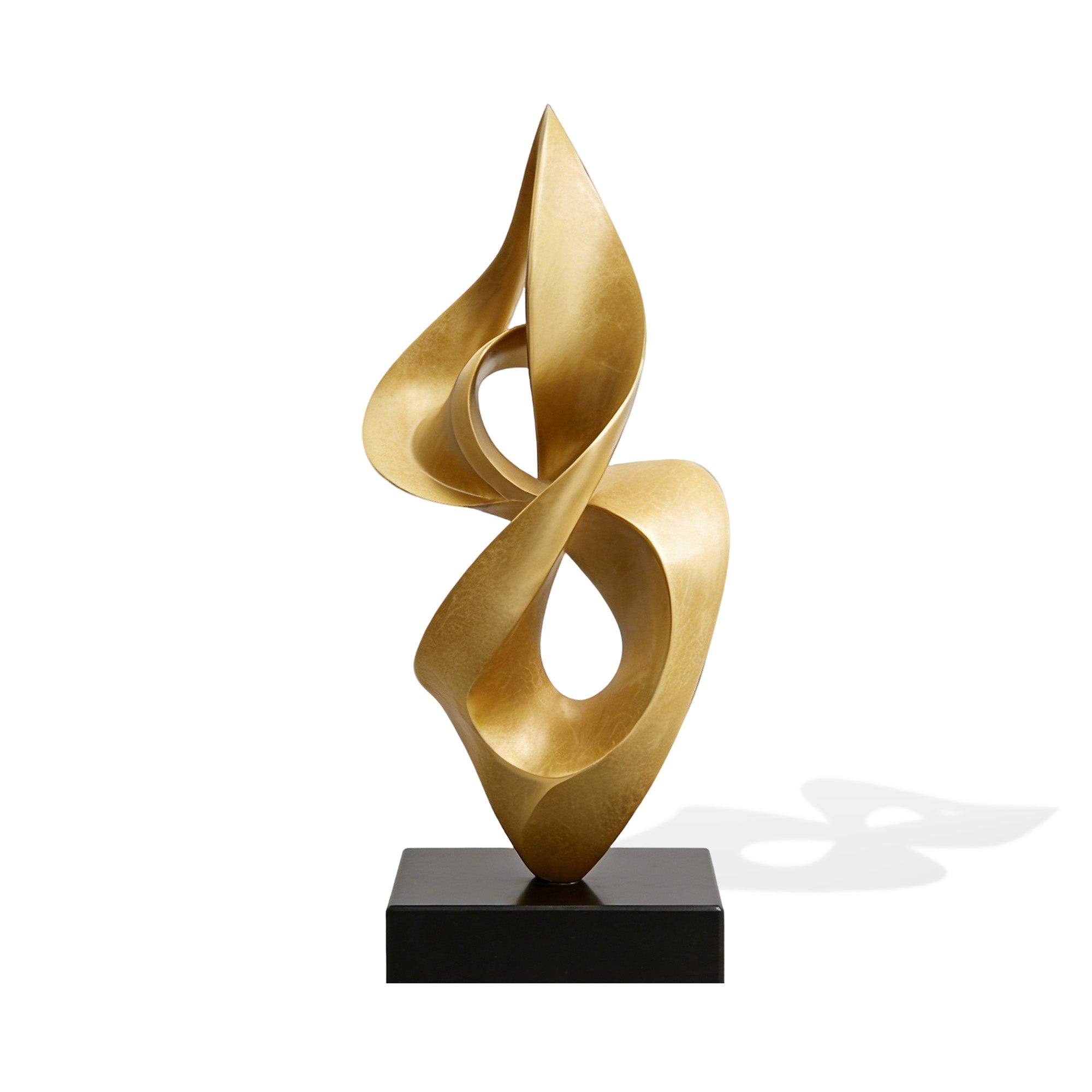 Front view of a gold bronze abstract ribbon sculpture with twisting vertical form, smooth open cutouts, leaf-like curves, and black rectangular base on a white background.
