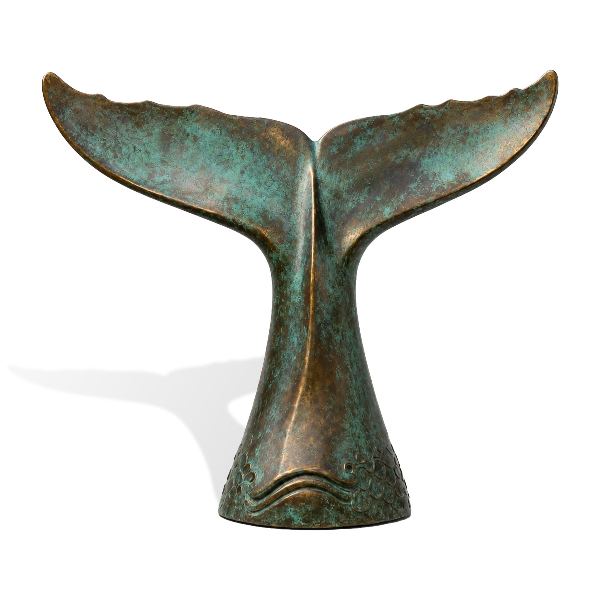Verdigris bronze whale tail sculpture with wide raised fluke, ocean-inspired wave details, blue-green patina finish, and marine tail form on white background