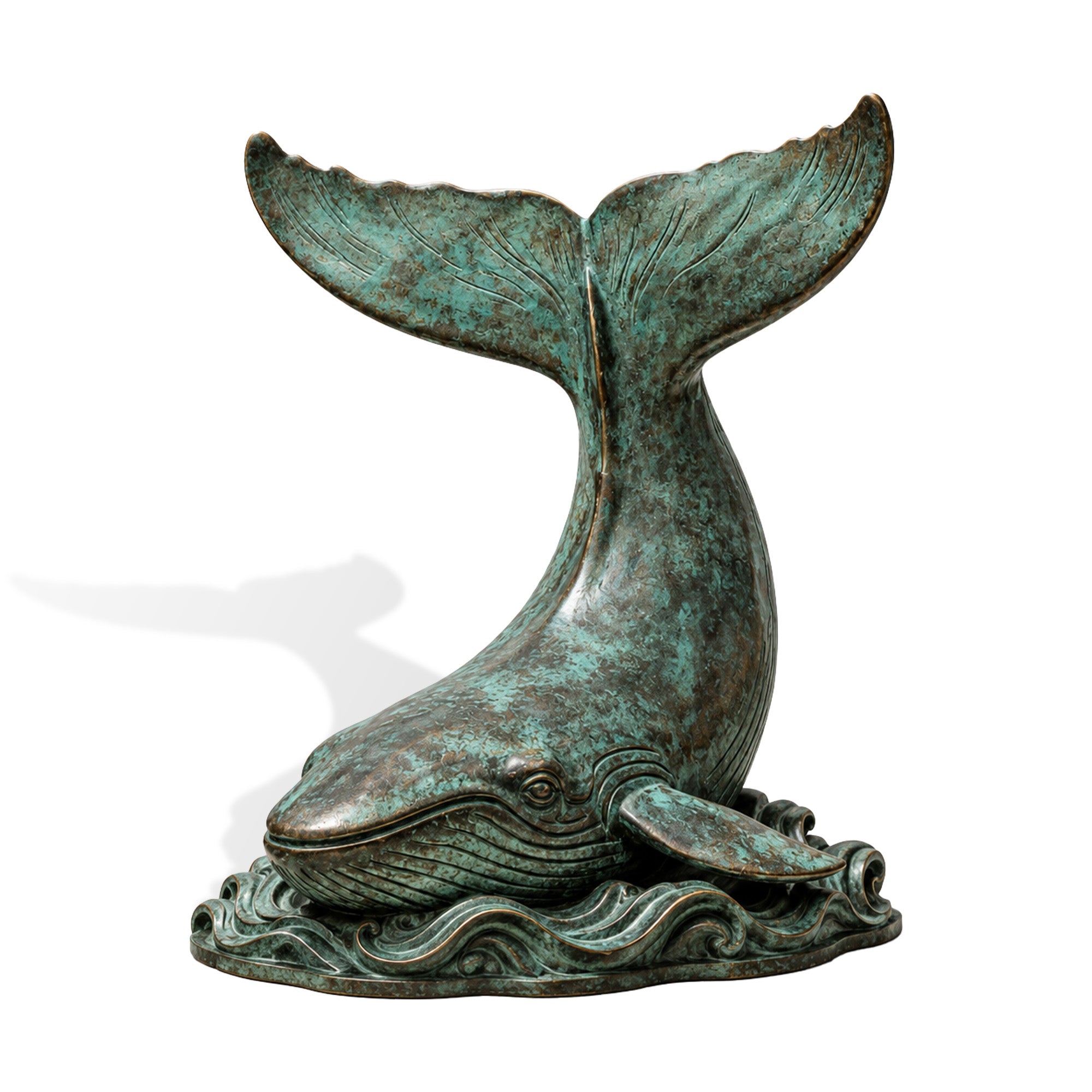 Bronze whale statue with raised tail, detailed whale body, ocean wave base, aged green patina finish, and marine animal sculpture design on white background