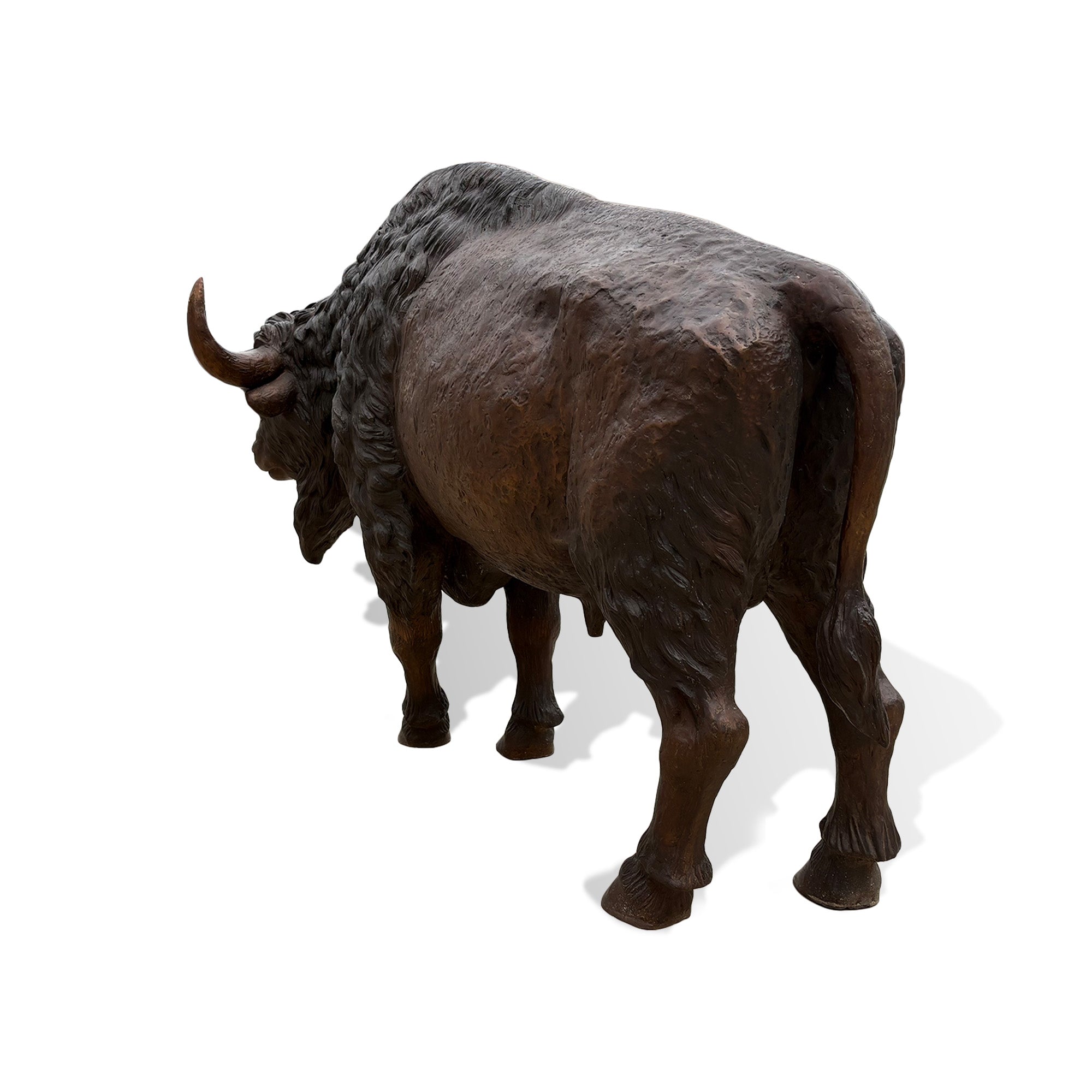 Back view of a bronze bison statue showing detailed muscular body, textured fur, and handcrafted wildlife sculpture details