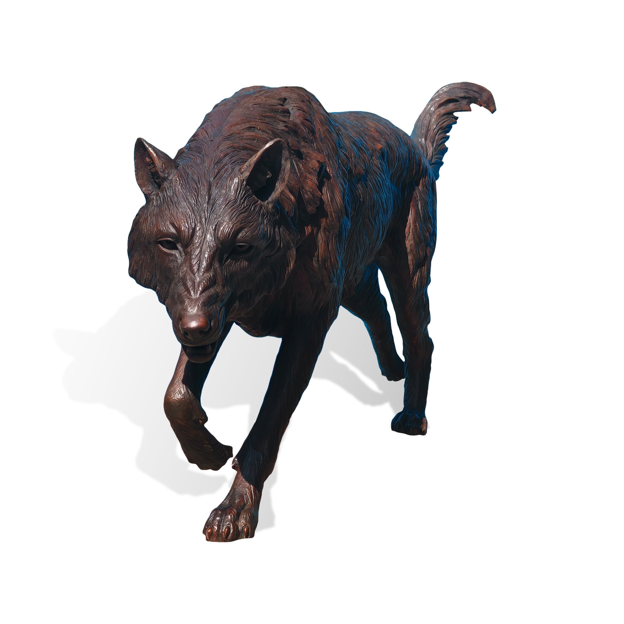 Front view of a bronze wolf animal sculpture with lifelike facial expression, textured fur details, strong posture, and handcrafted outdoor decor artwork.