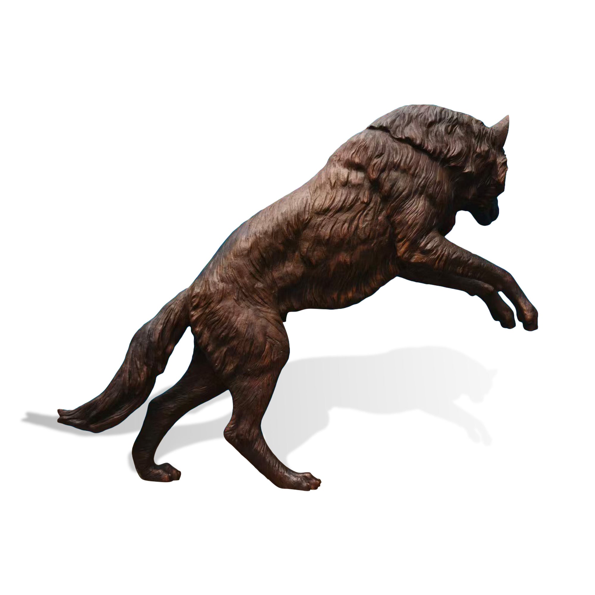 Dynamic jumping bronze wolf sculpture with realistic fur texture, powerful movement pose, detailed animal anatomy, and handcrafted wildlife art design.