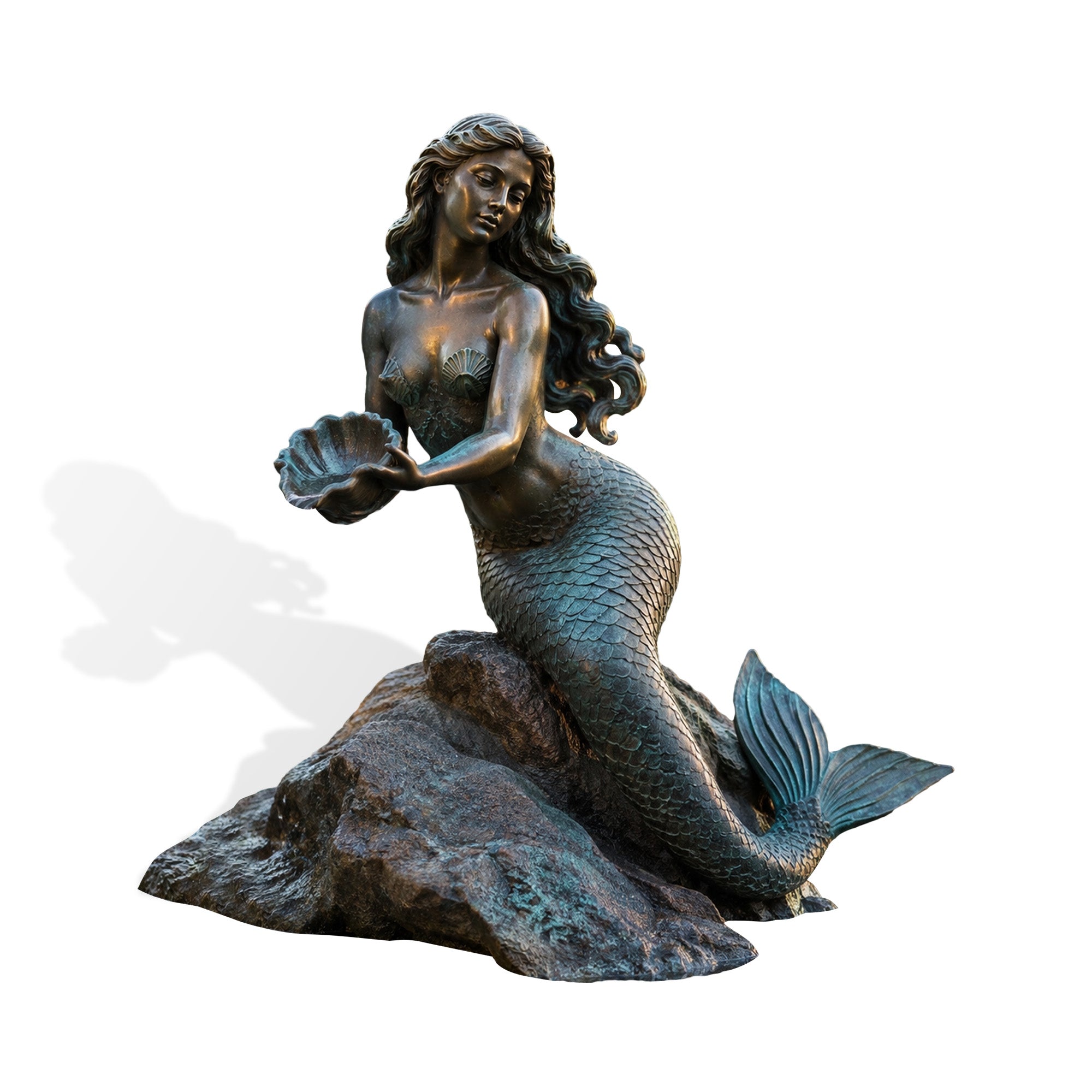 Bronze mermaid fountain statue featuring a graceful female figure with long flowing hair, detailed scaled tail and large fin, holding a seashell water spout while seated on a textured rock base.