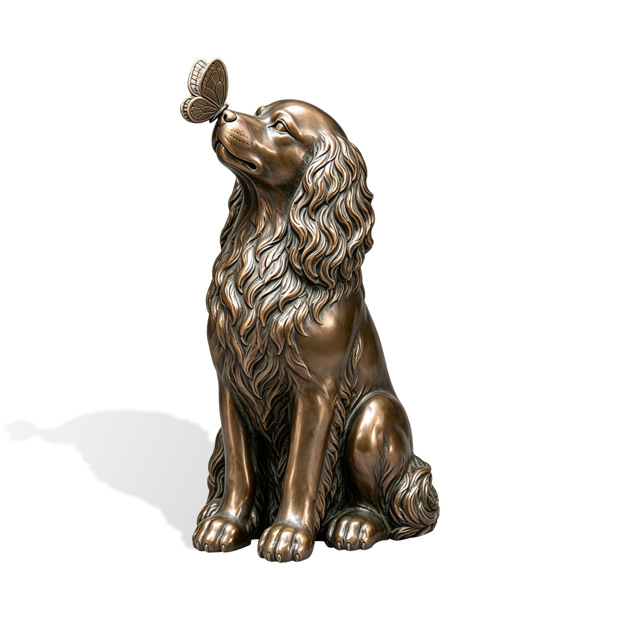 Detailed bronze dog statue seated with its head raised toward a butterfly resting on its nose, featuring sculpted flowing fur, expressive eyes, and an antique bronze patina.