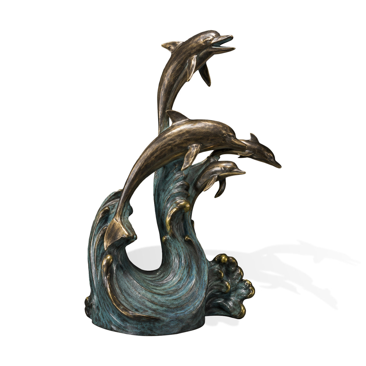 Bronze dolphin sculpture featuring four leaping dolphins above sculpted ocean waves, with detailed marine forms, warm bronze highlights, and a hand-applied verdigris patina finish.