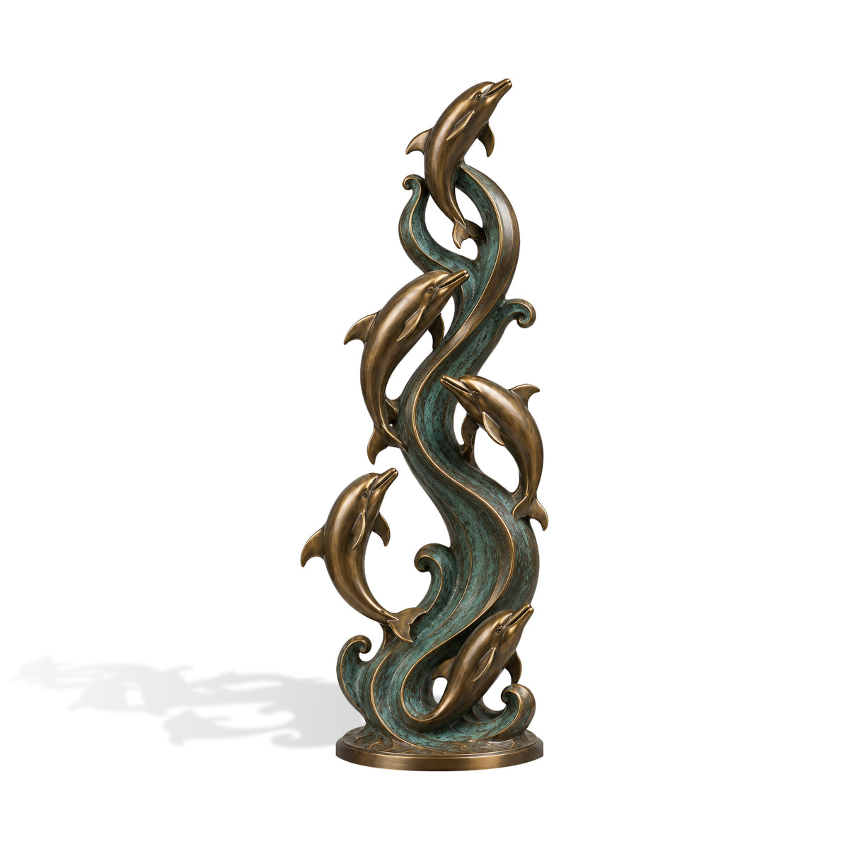 Bronze dolphin sculpture featuring five playful dolphins swimming around blue green ocean waves