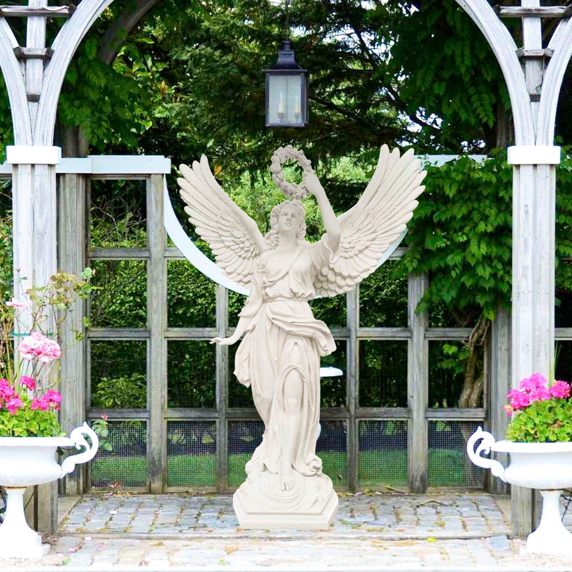 white color elegent angel fiberglass statue with flower ring aloft on hand