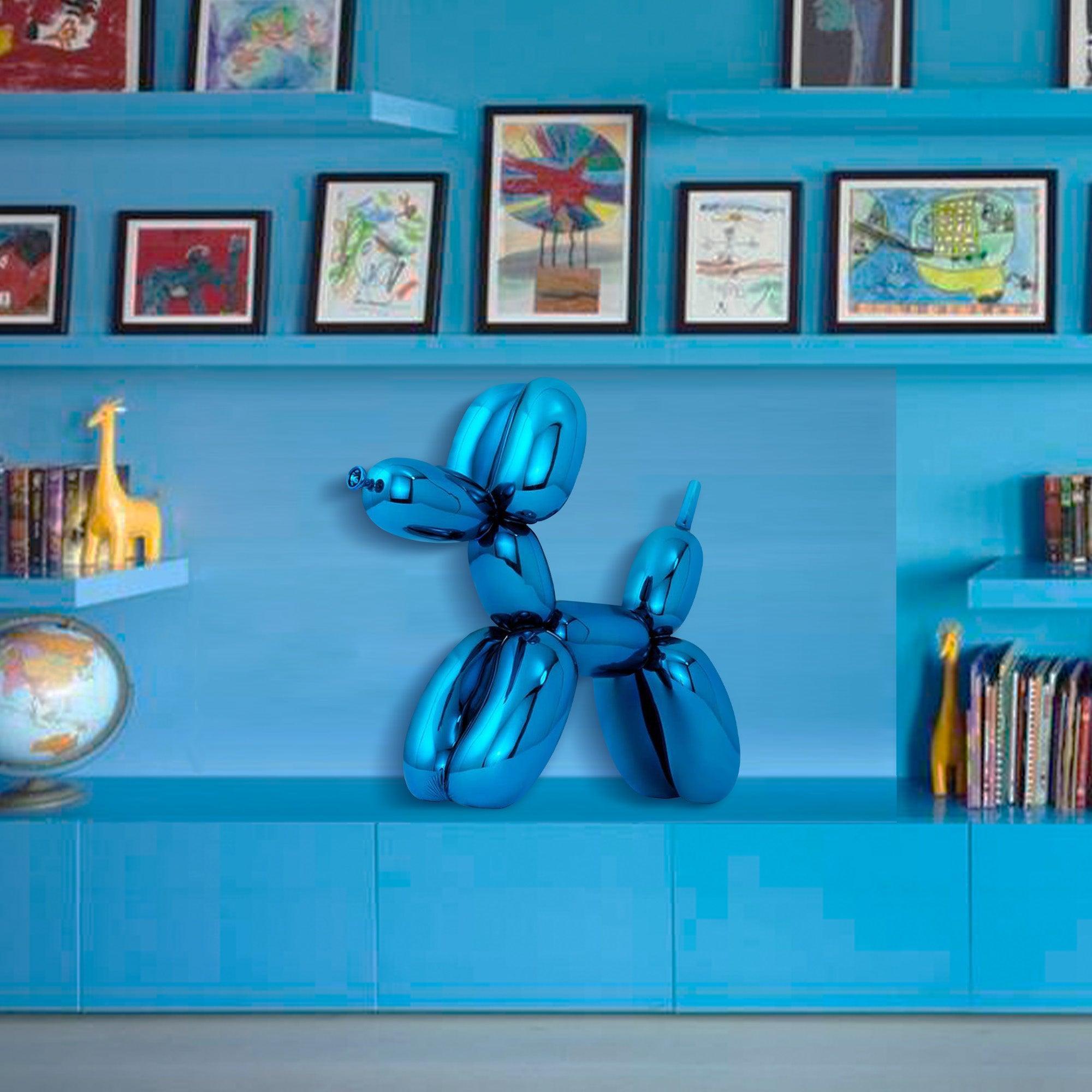 blue balloon dog fiberglass sculpture displaying on the bookshelf