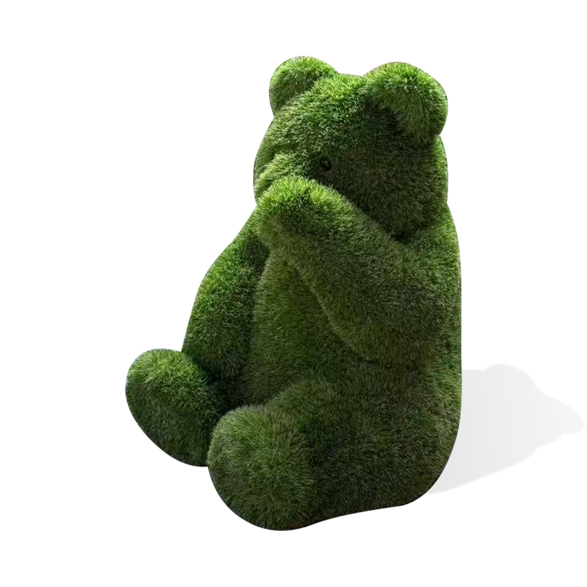 Green fiberglass bear sculpture covered in artificial grass