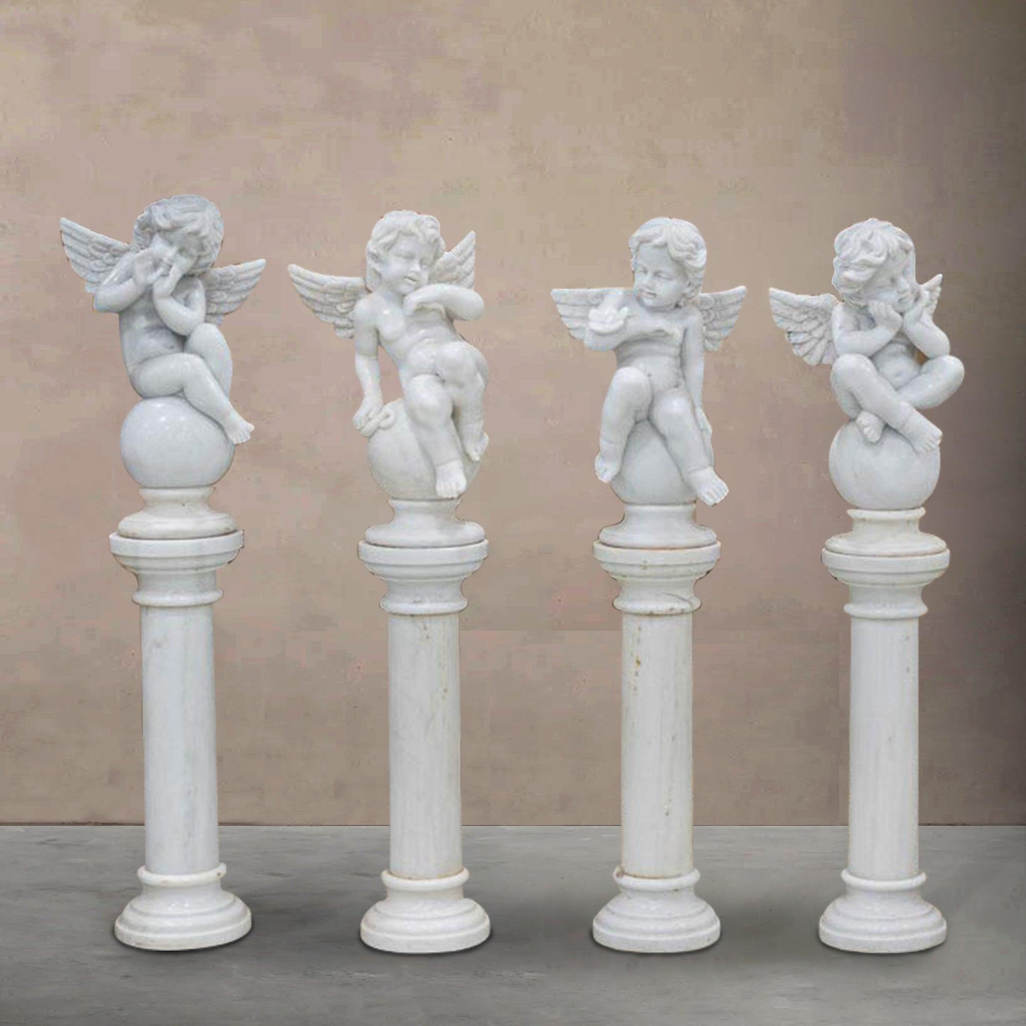 four cherub white marble statues with pillar base