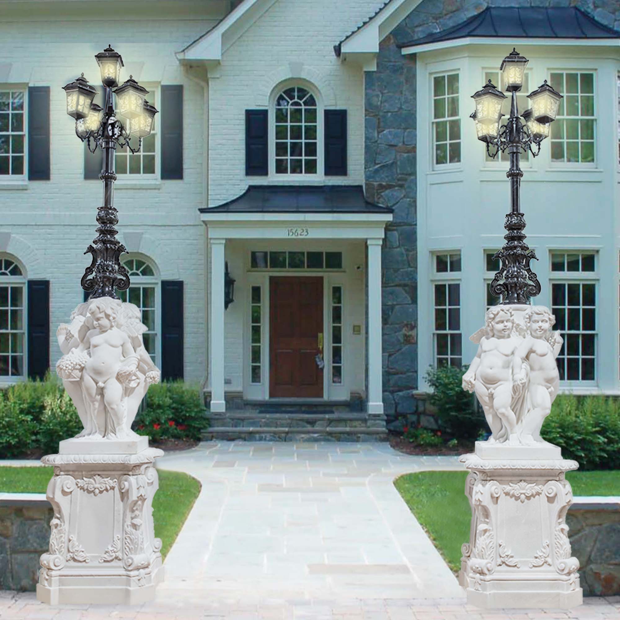 a pair outdoor angle lamp marble statues in black lamp and white marble with beautiful pedestals